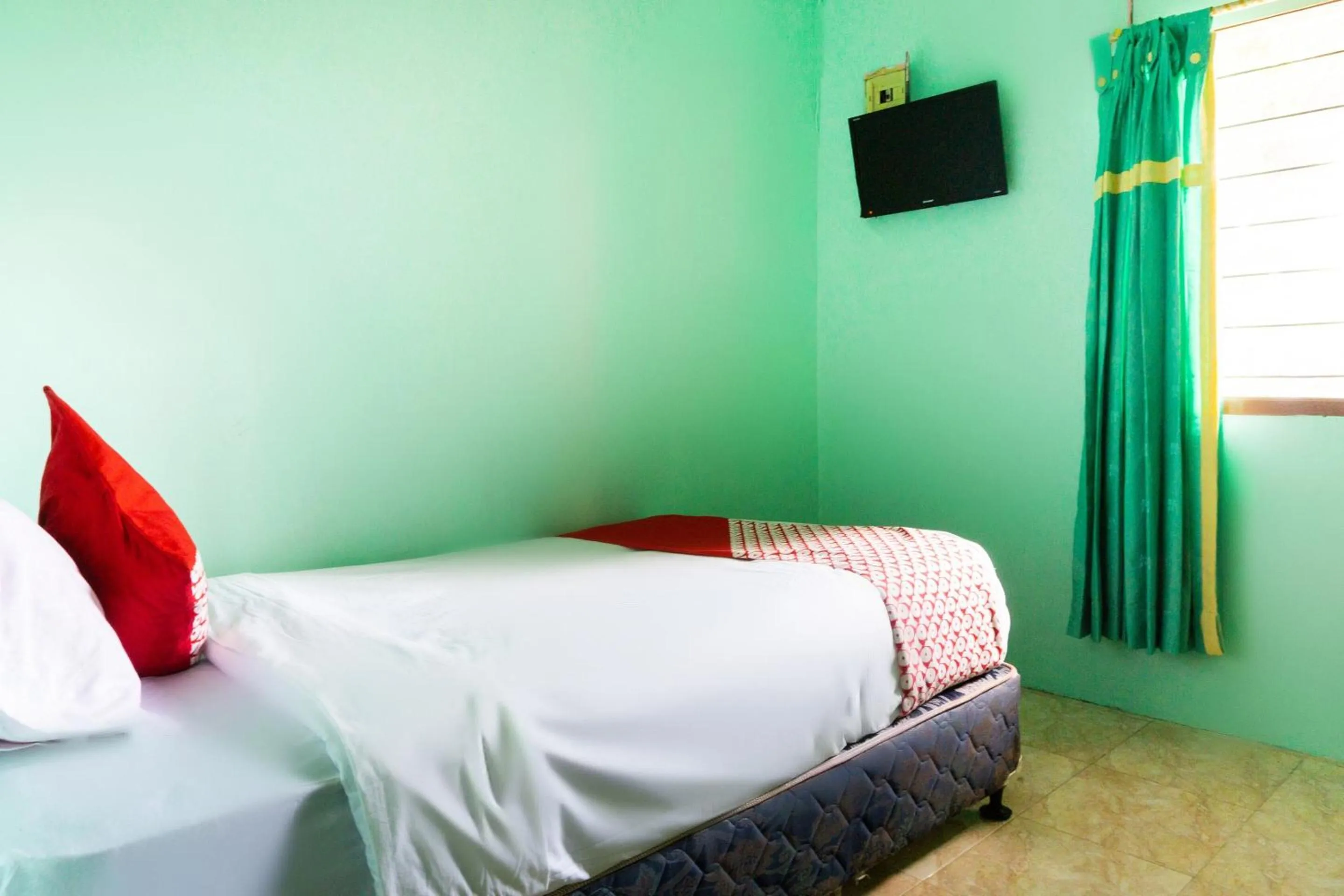 Bedroom in Hotel O Semarapura Homestay