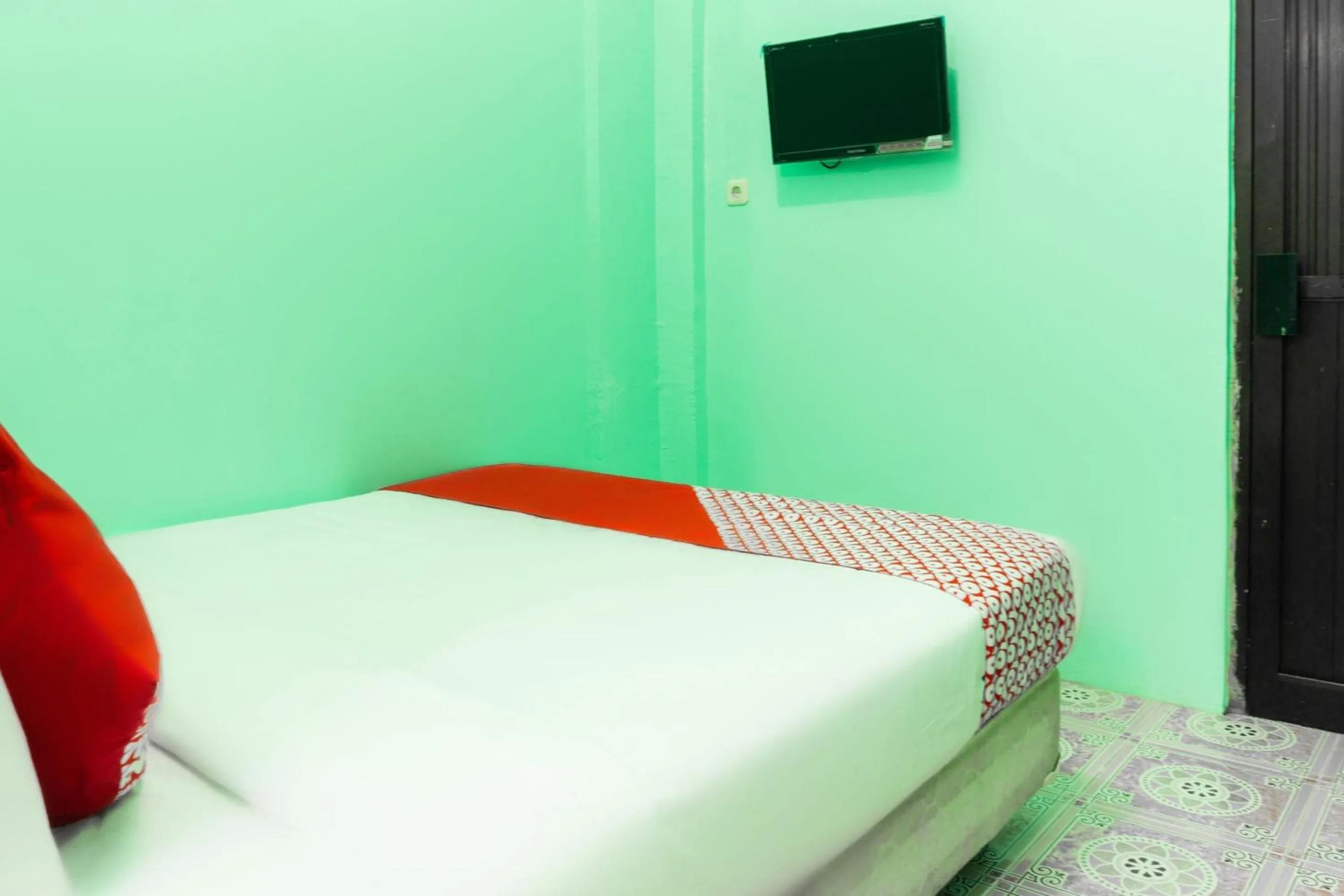 Bedroom in Hotel O Semarapura Homestay