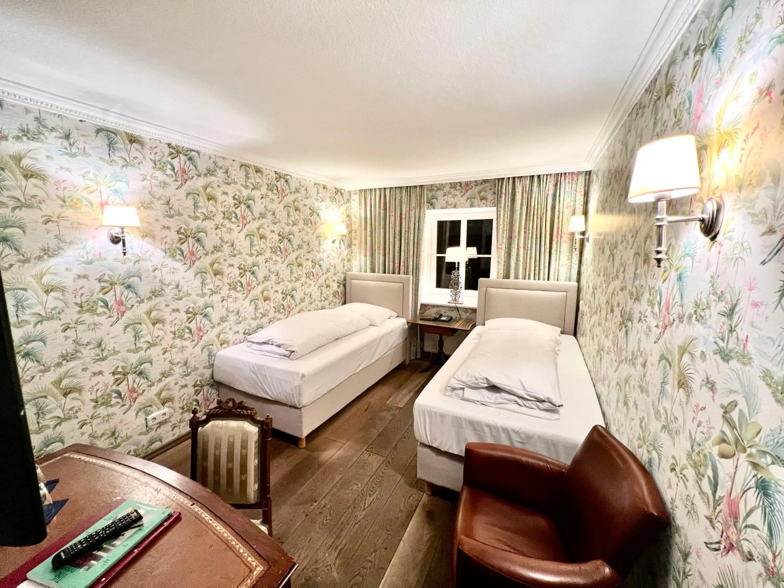 Bed in Hotel Ashley's Garden