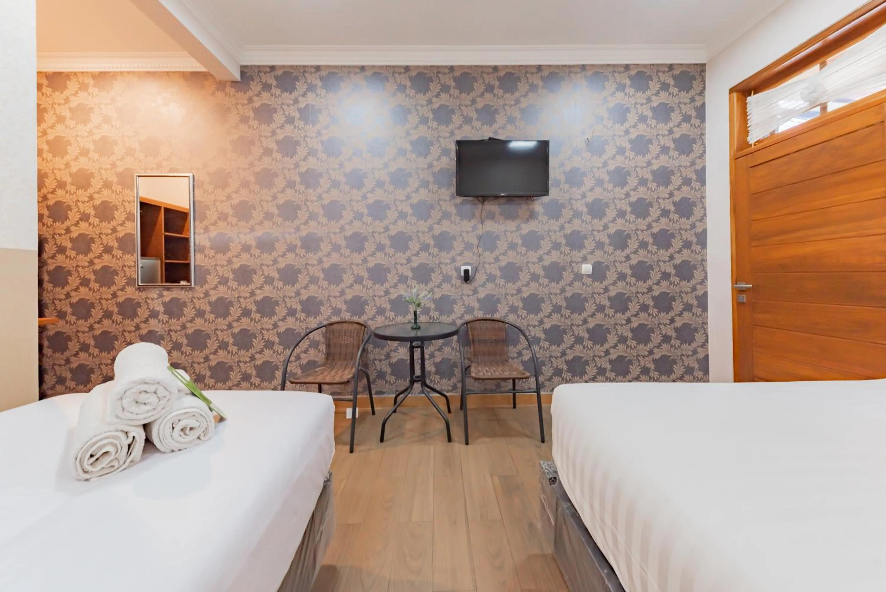 Bedroom, Bed in Urbanview Hotel Villa Surya Bandung