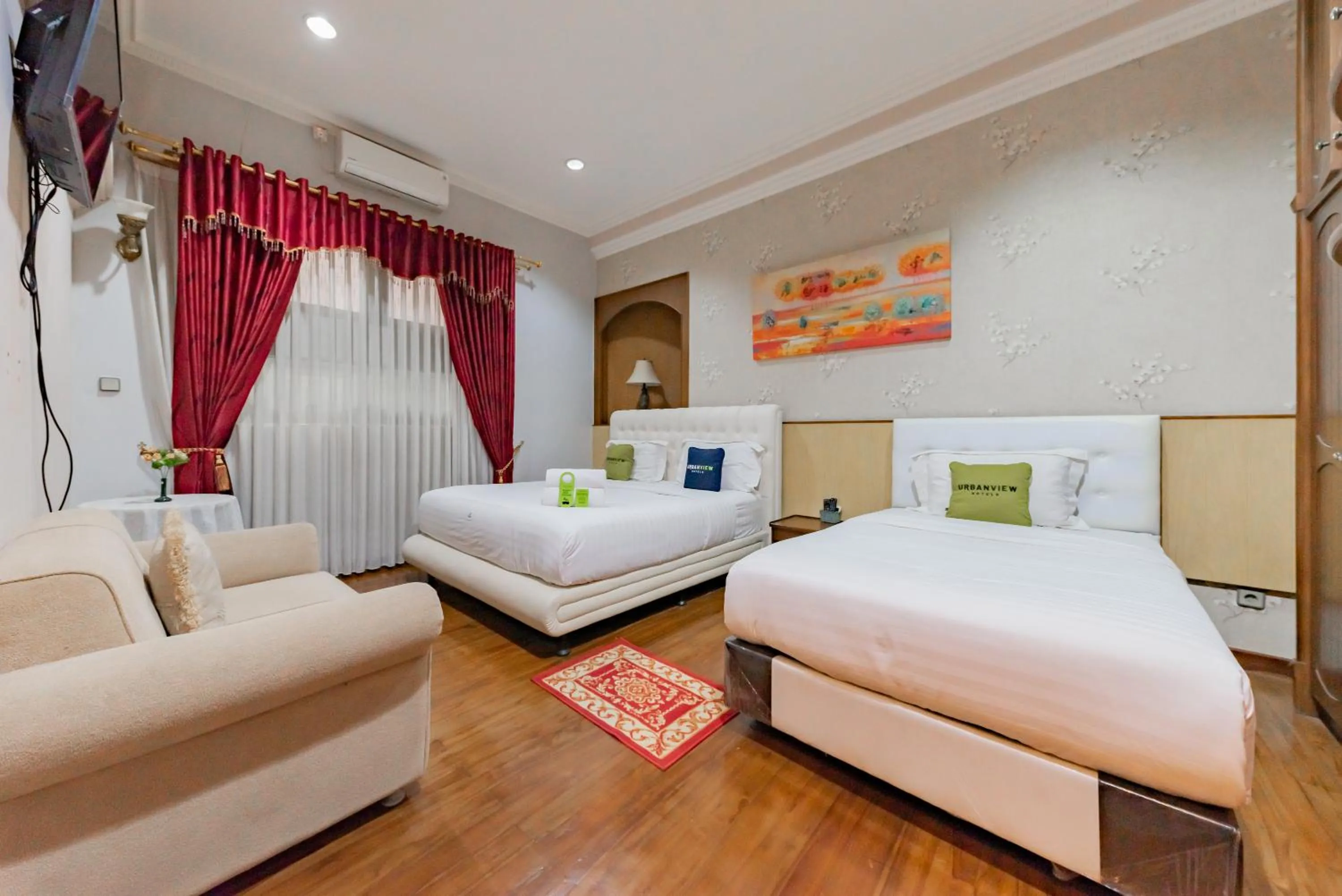 Bedroom, Bed in Urbanview Hotel Villa Surya Bandung