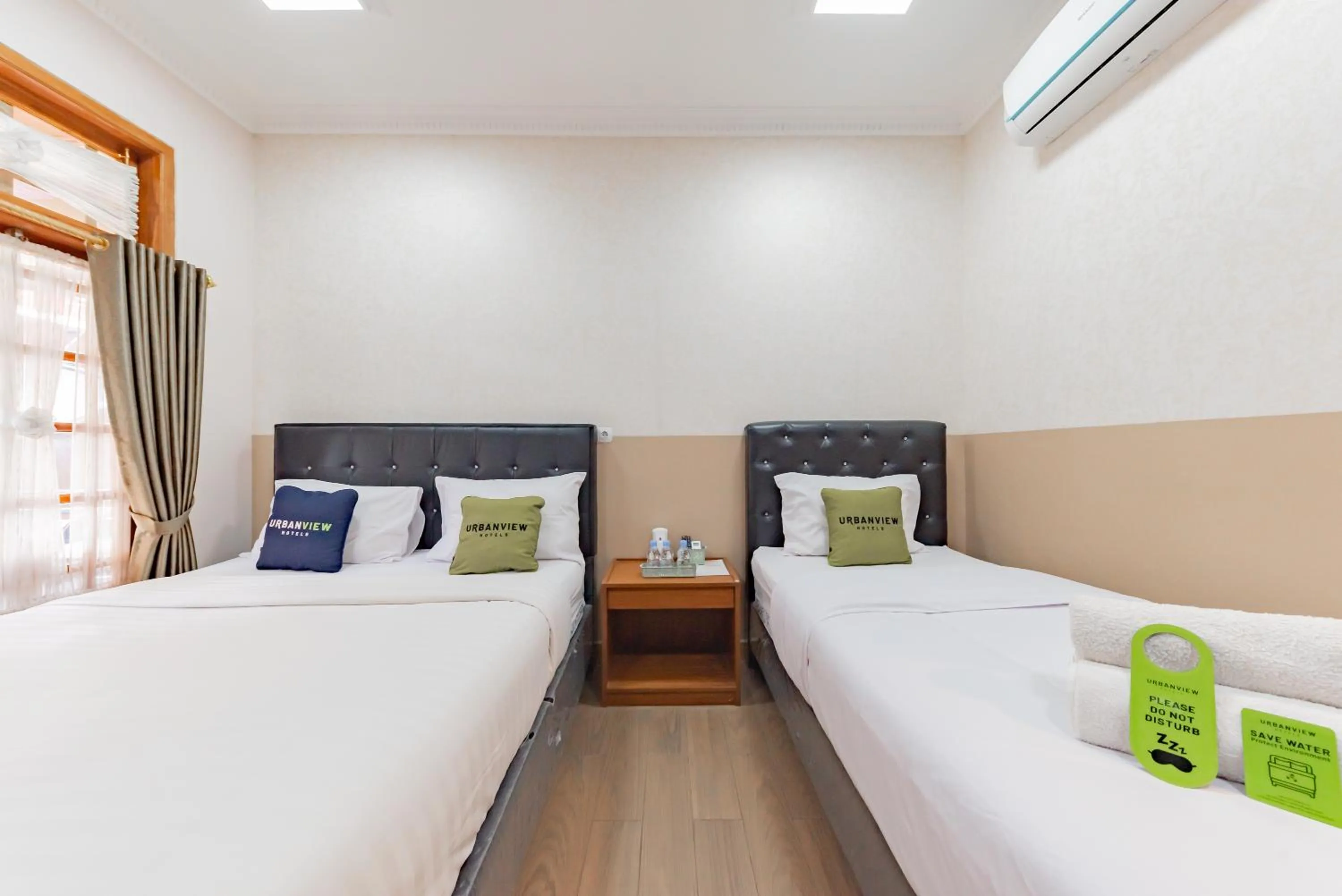 Bedroom, Bed in Urbanview Hotel Villa Surya Bandung