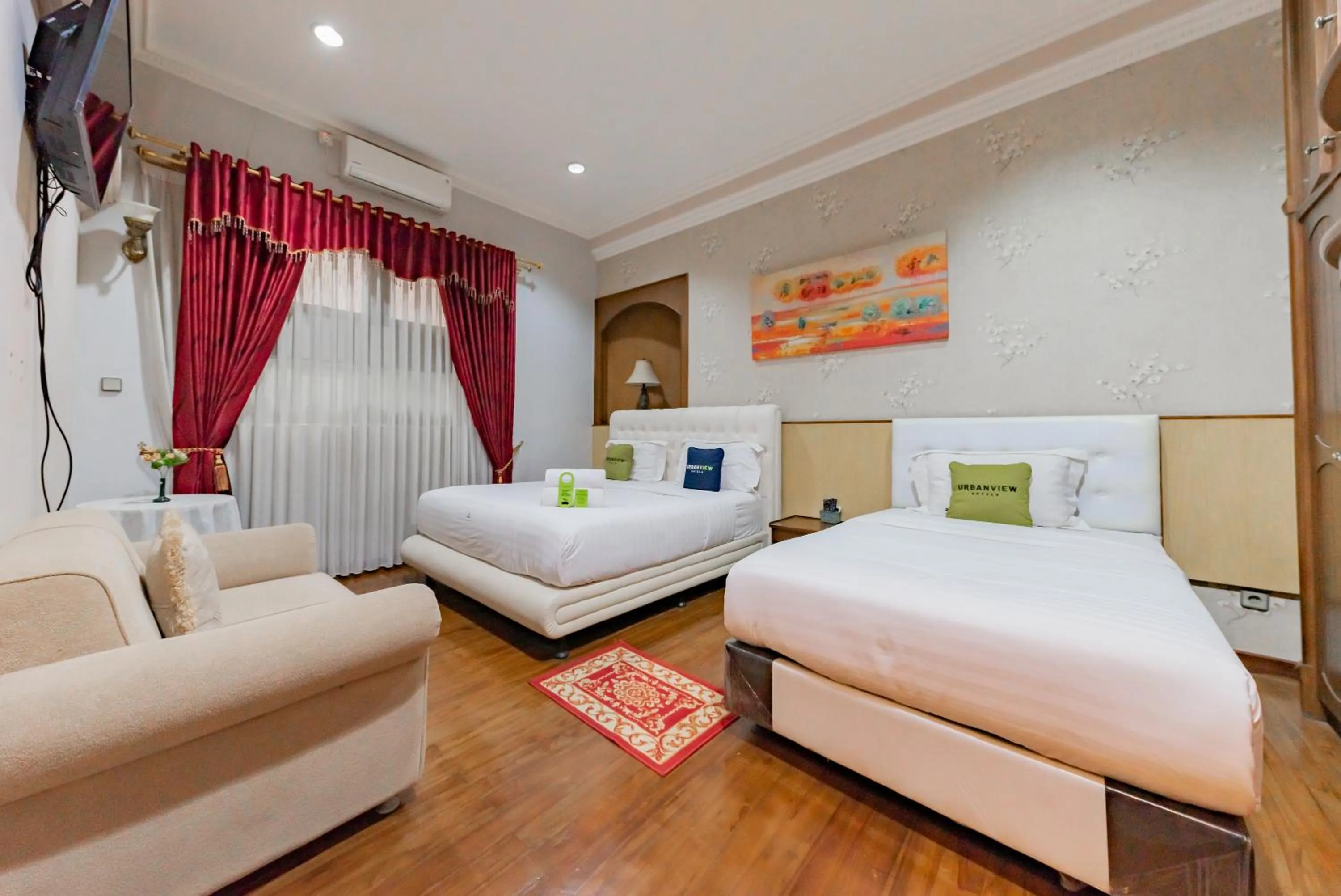 Bedroom, Bed in Urbanview Hotel Villa Surya Bandung