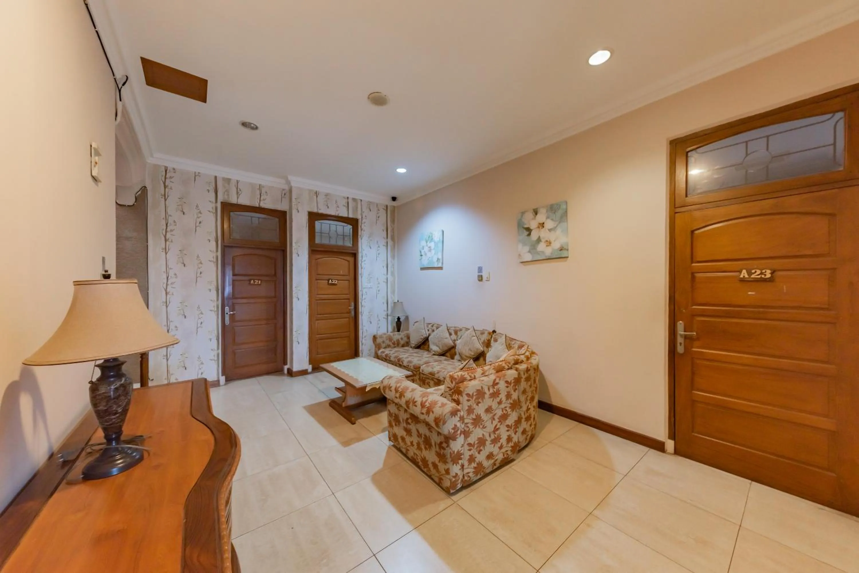 Seating area in Urbanview Hotel Villa Surya Bandung