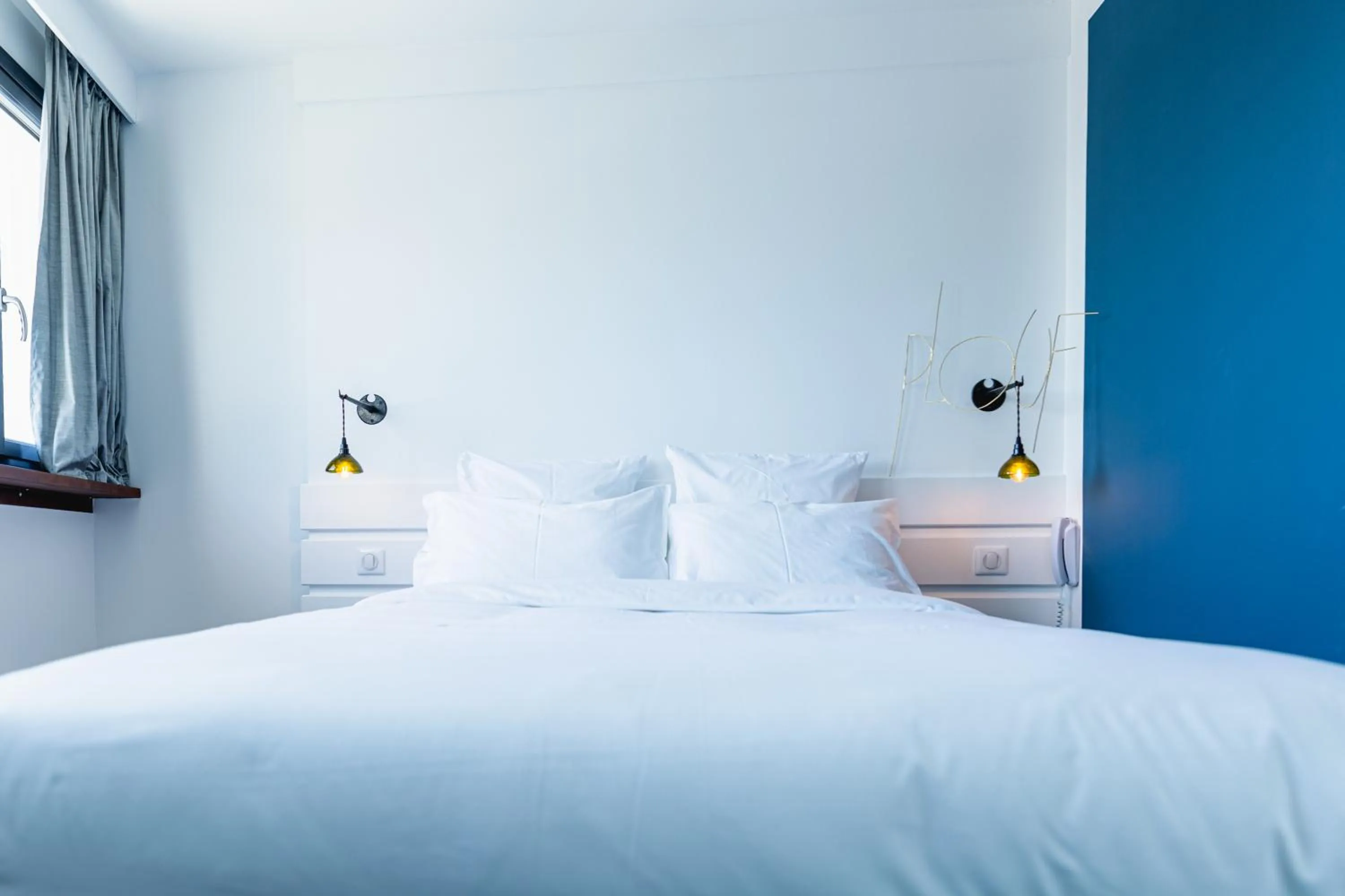 Bed in Bateau Libre Hotel