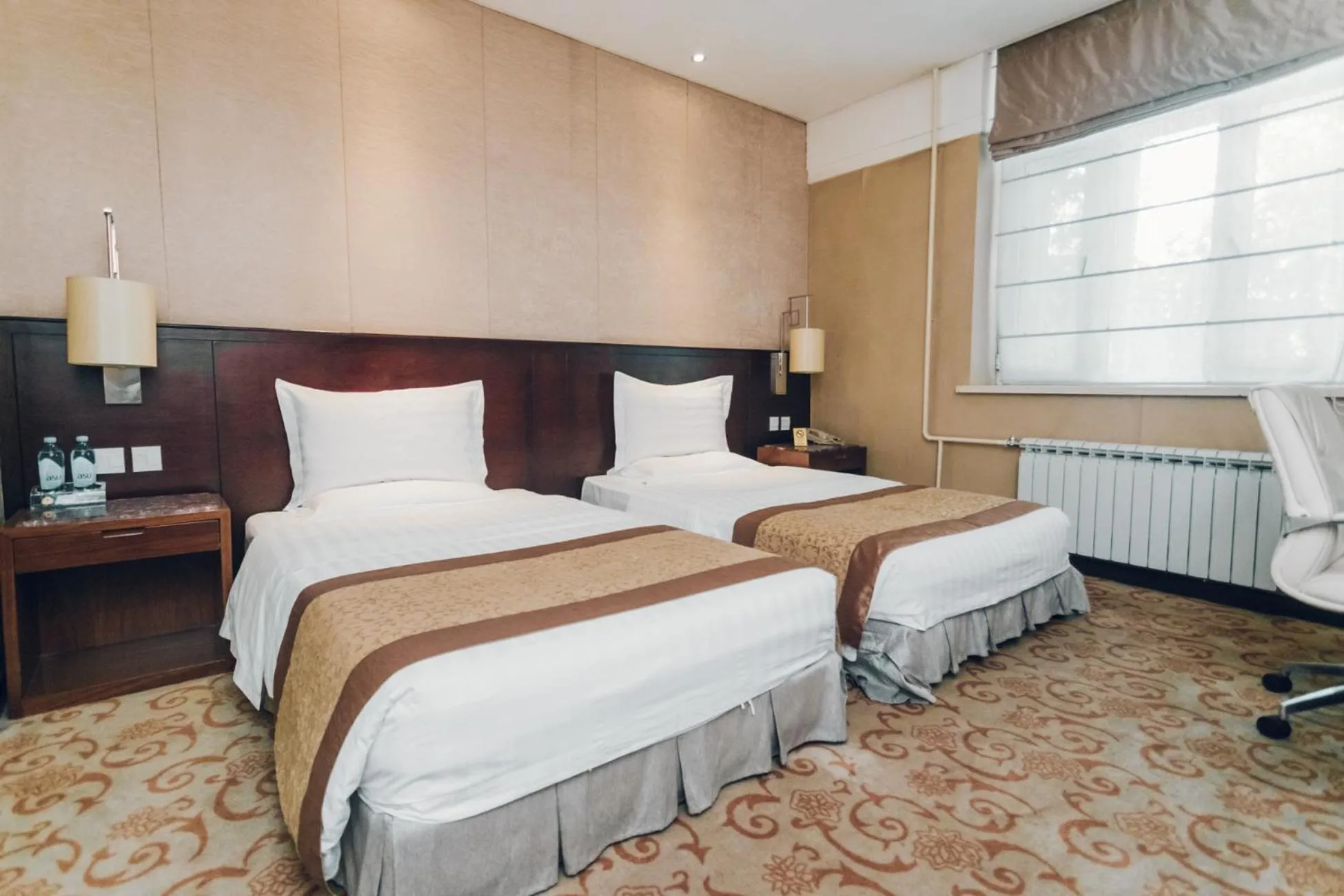 Bed in Soluxe Hotel Almaty
