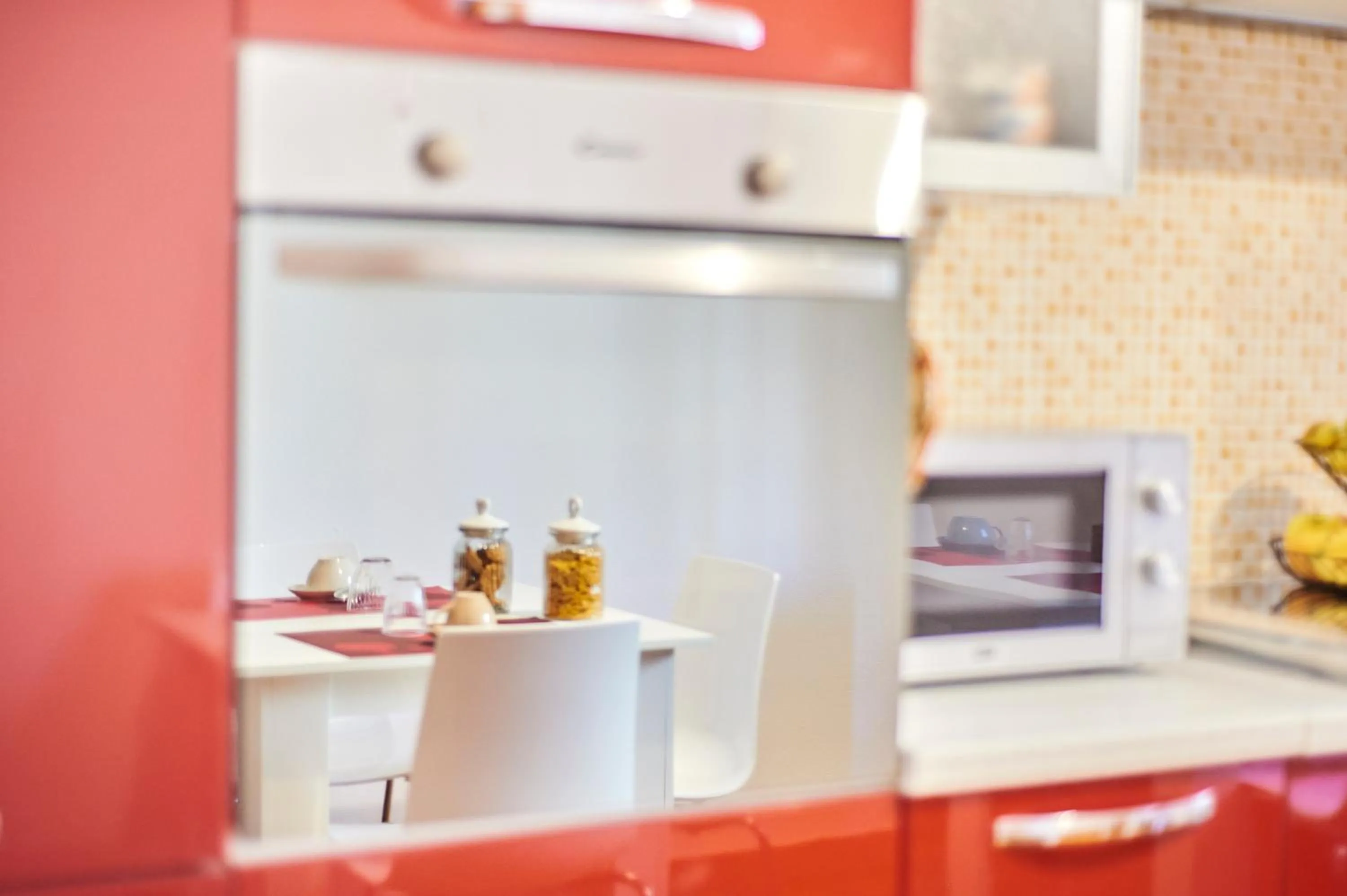 Kitchen or kitchenette in Tidu's home B&B