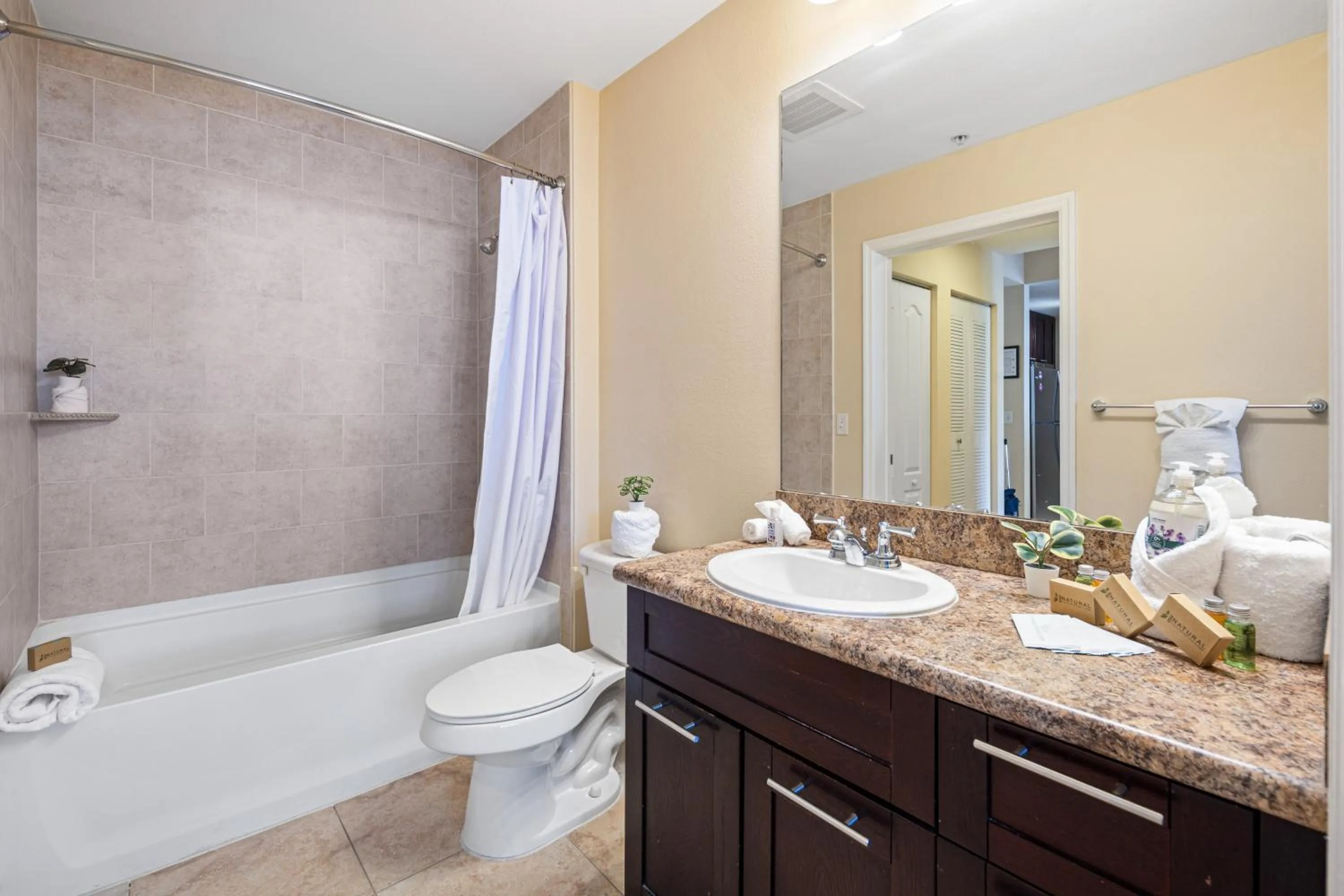 Bathroom in Dharma Home Suites South Miami at Red Road Commons