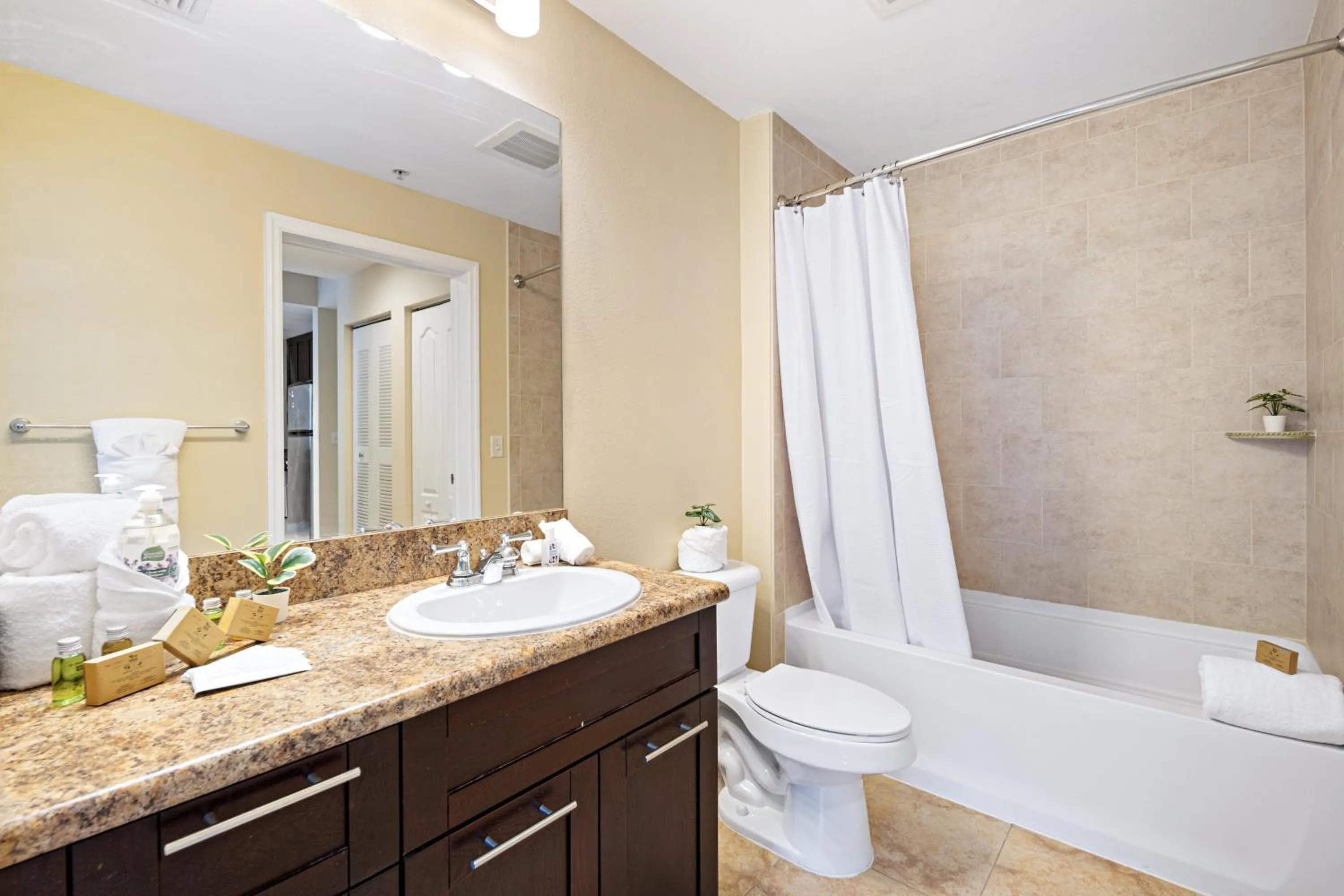 Bathroom in Dharma Home Suites South Miami at Red Road Commons