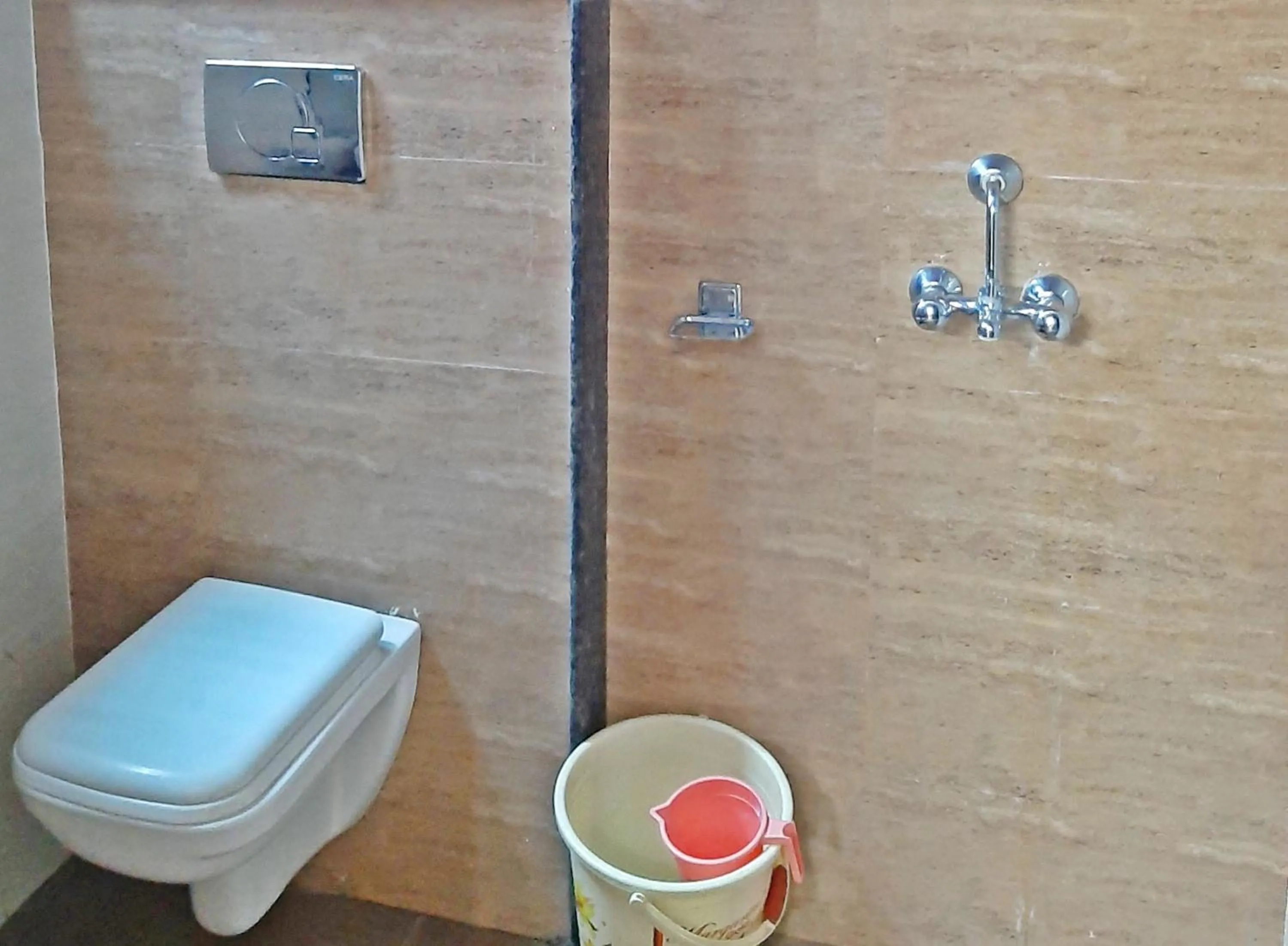 Bathroom in Bindiram Express by ShriGo Hotels
