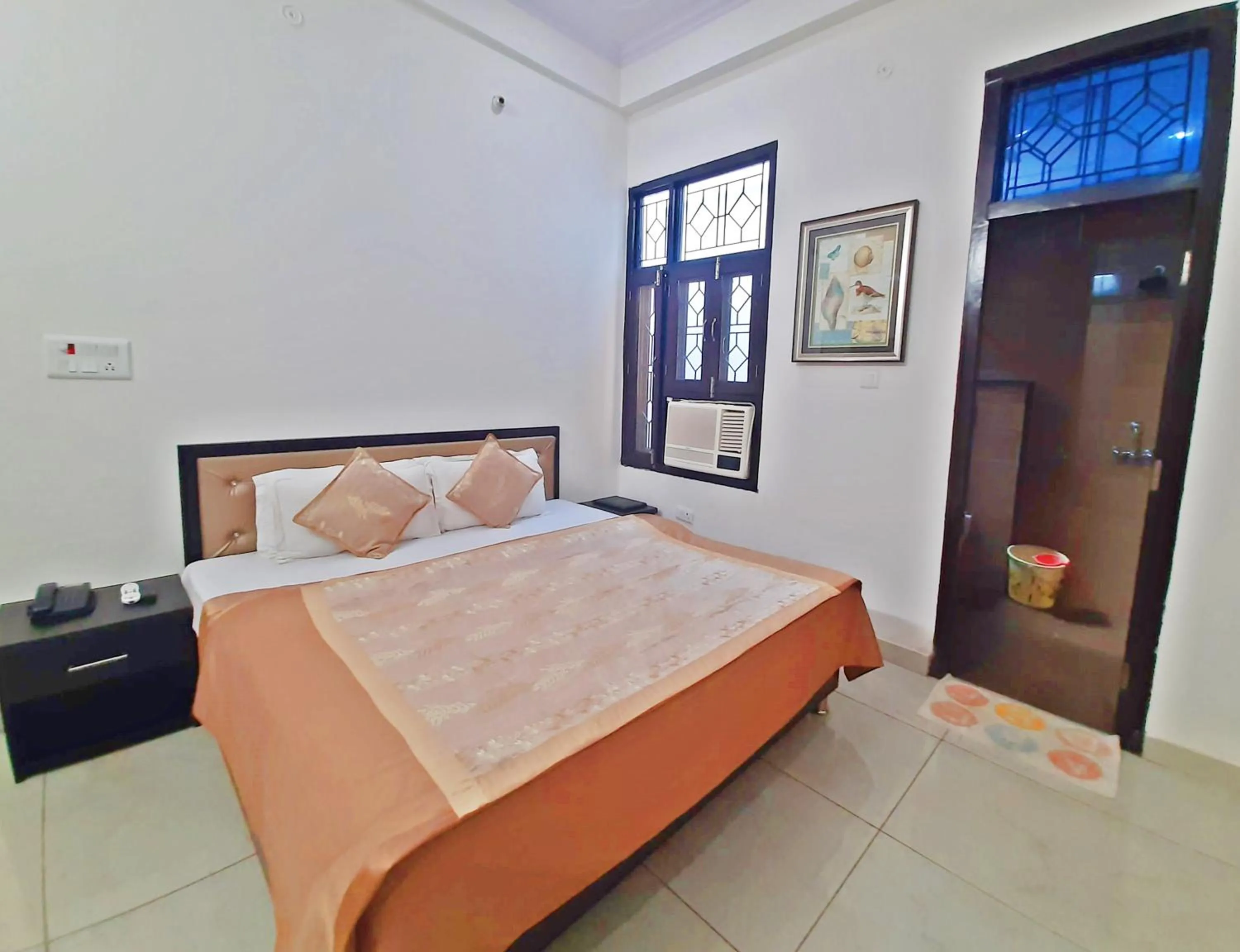 Photo of the whole room, Bed in Bindiram Express by ShriGo Hotels