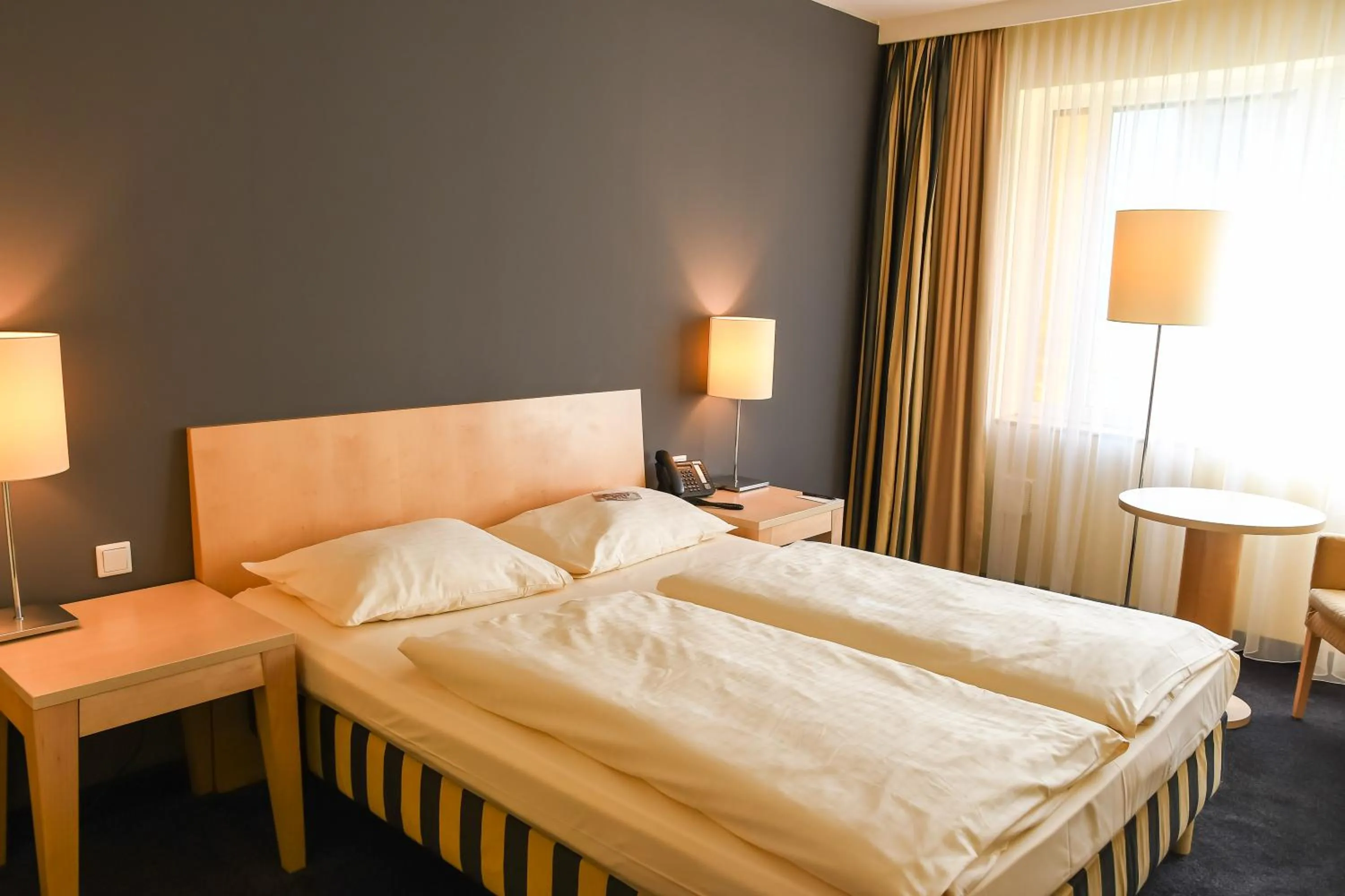 Bed in Relexa Hotel Ratingen City