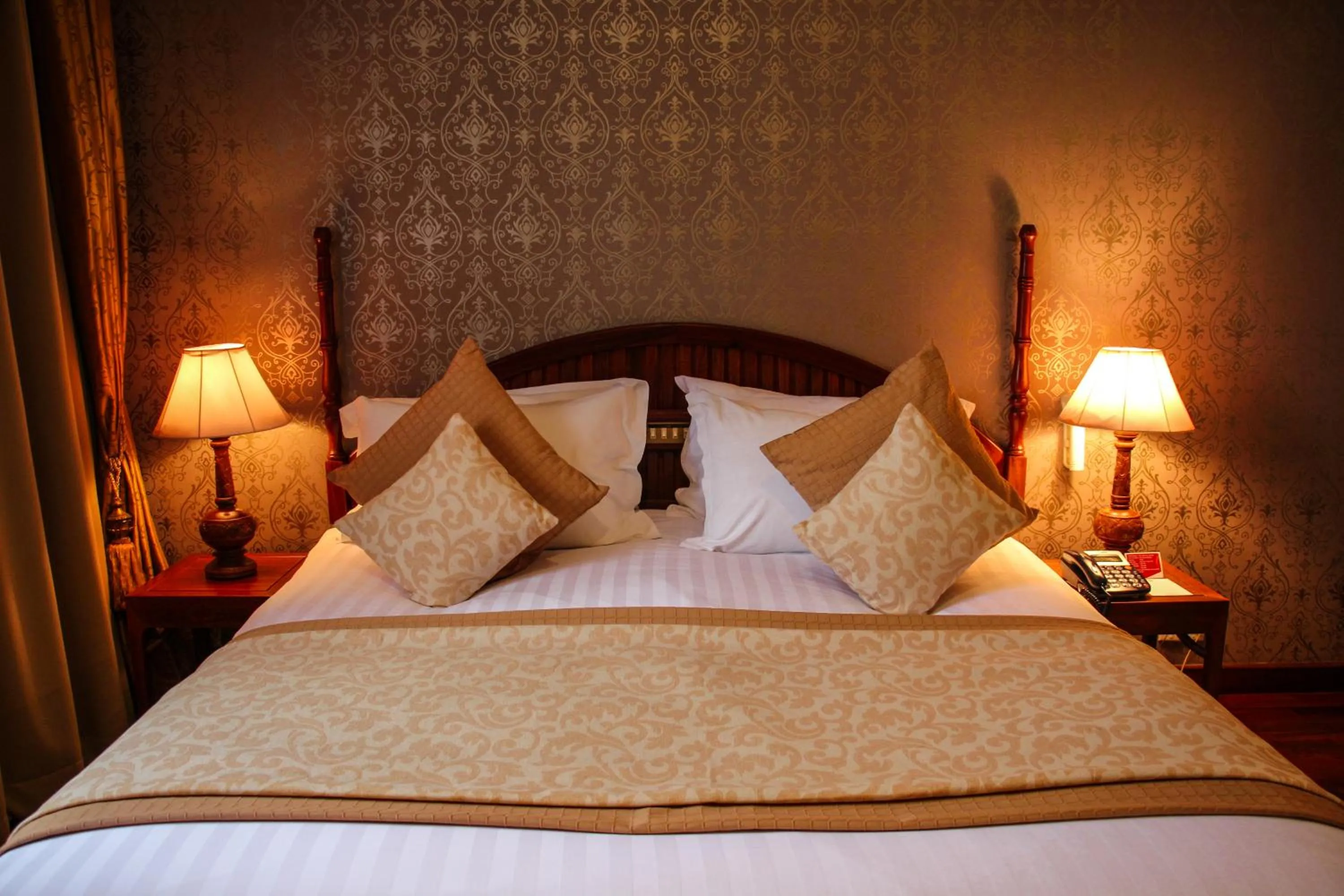 Bed in LAOTEL VIENTIANE