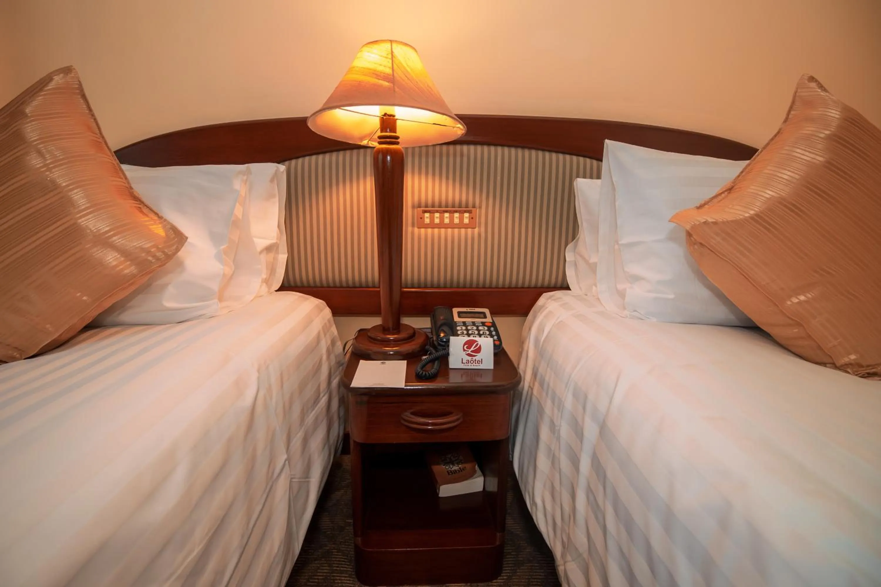 Bed in LAOTEL VIENTIANE