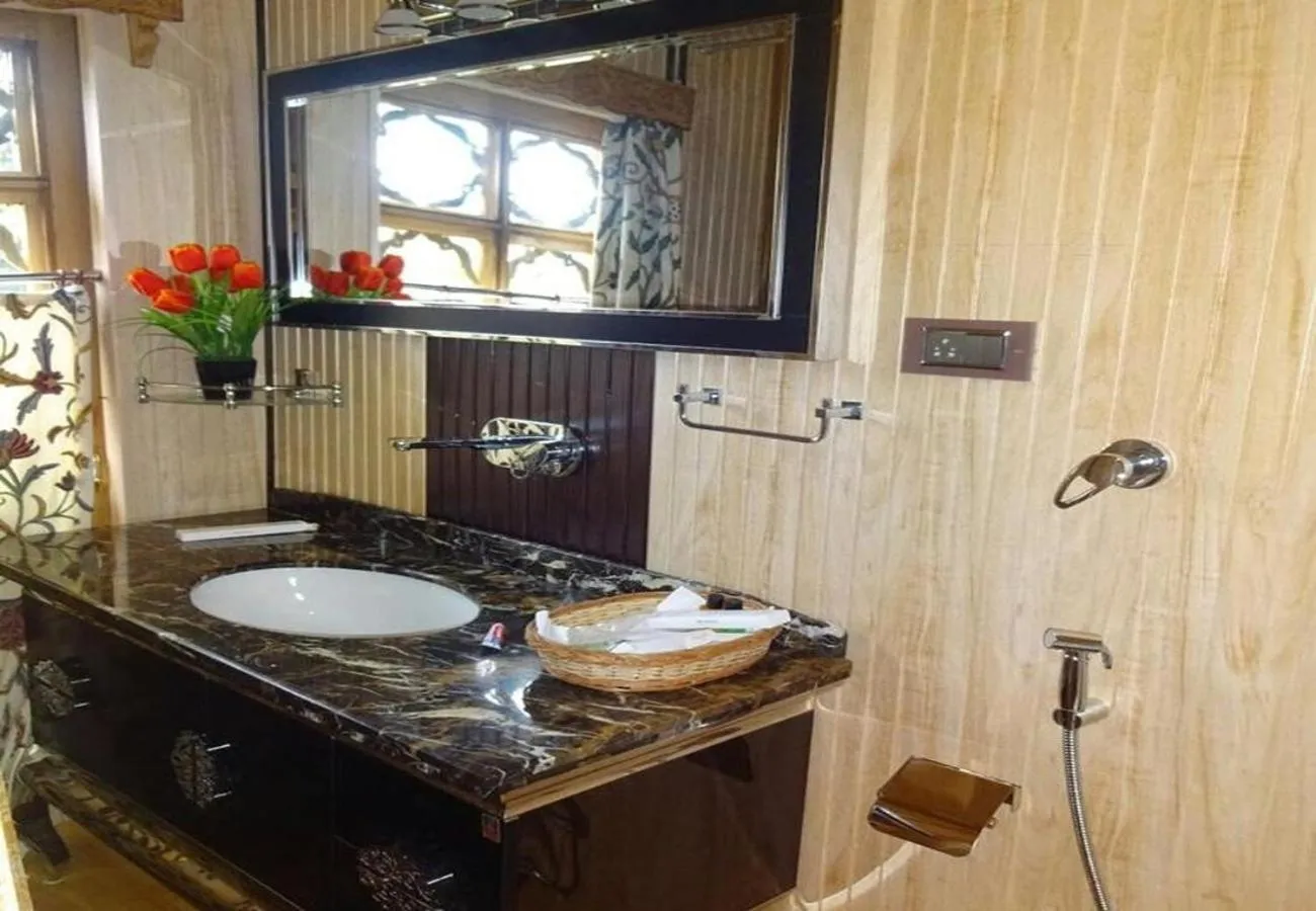 Bathroom in WelcomHeritage Gurkha Houseboats
