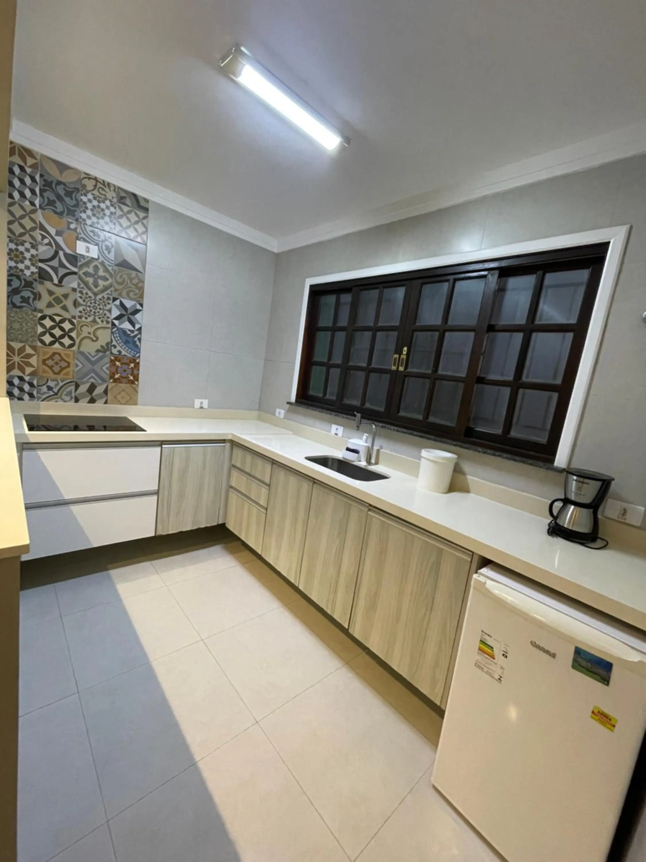 Kitchen or kitchenette in Pousada Chilli Brasil