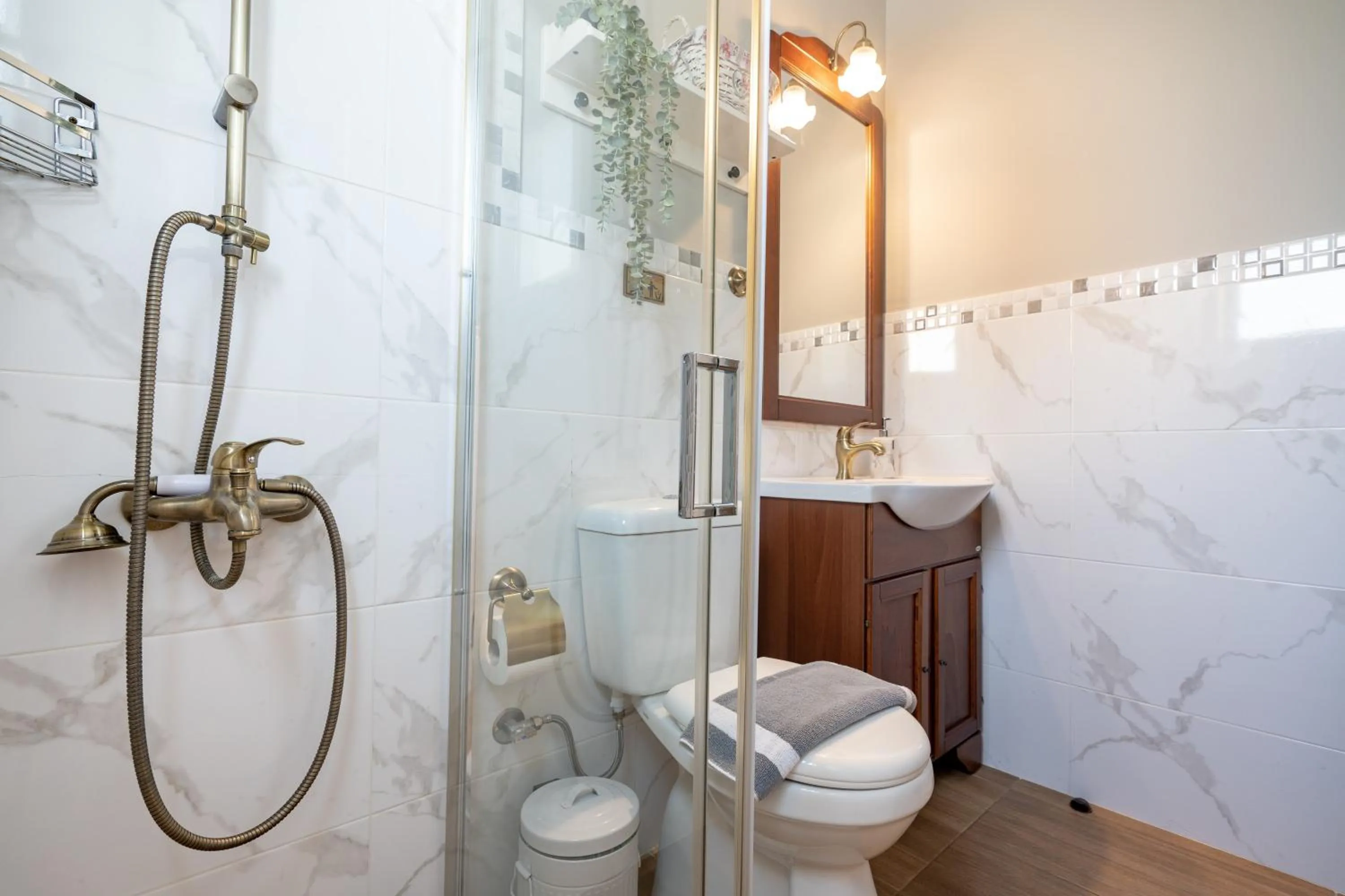 Bathroom in Olympia's Apartments by Traser