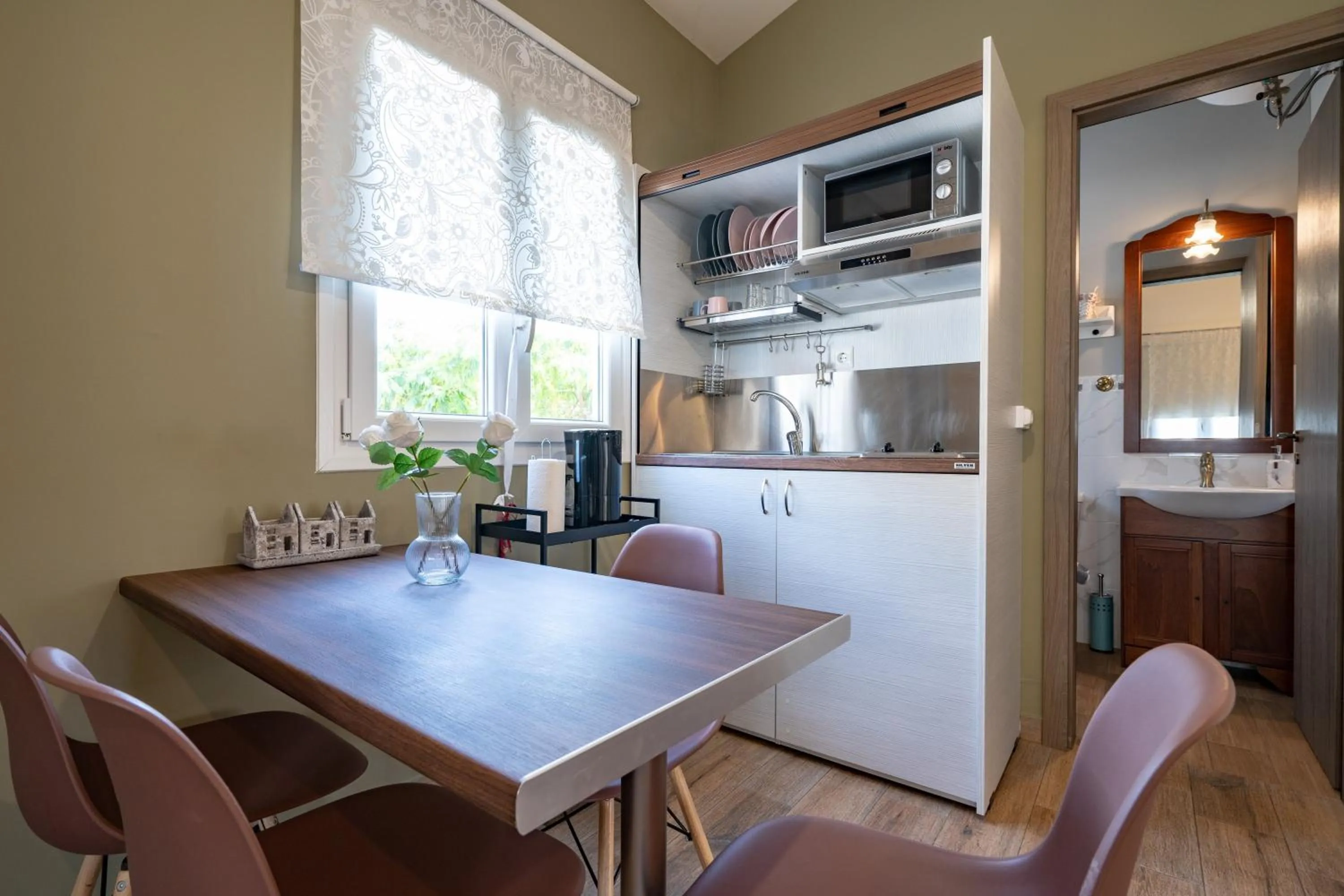 Kitchen or kitchenette in Olympia's Apartments by Traser