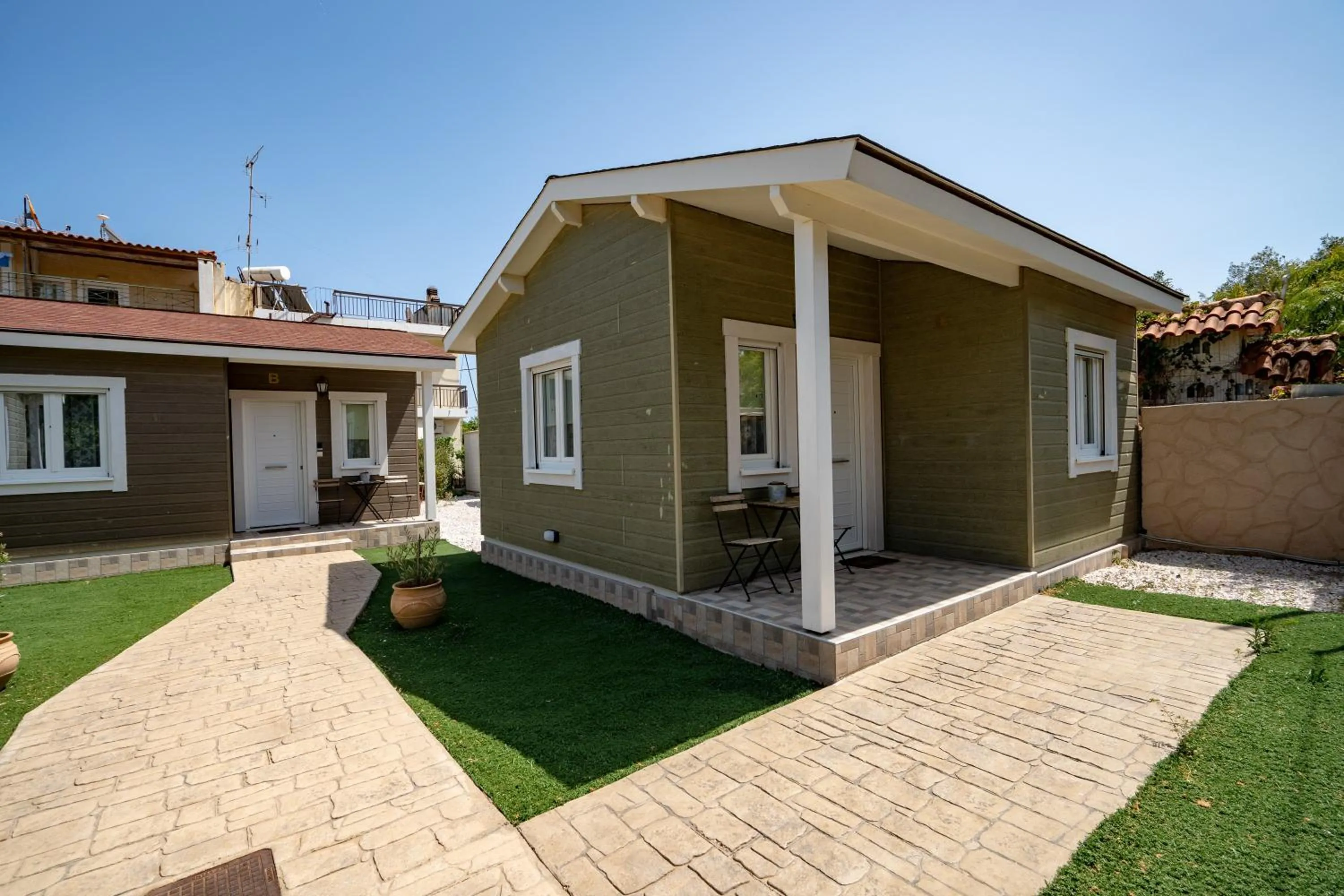 Property building in Olympia's Apartments by Traser