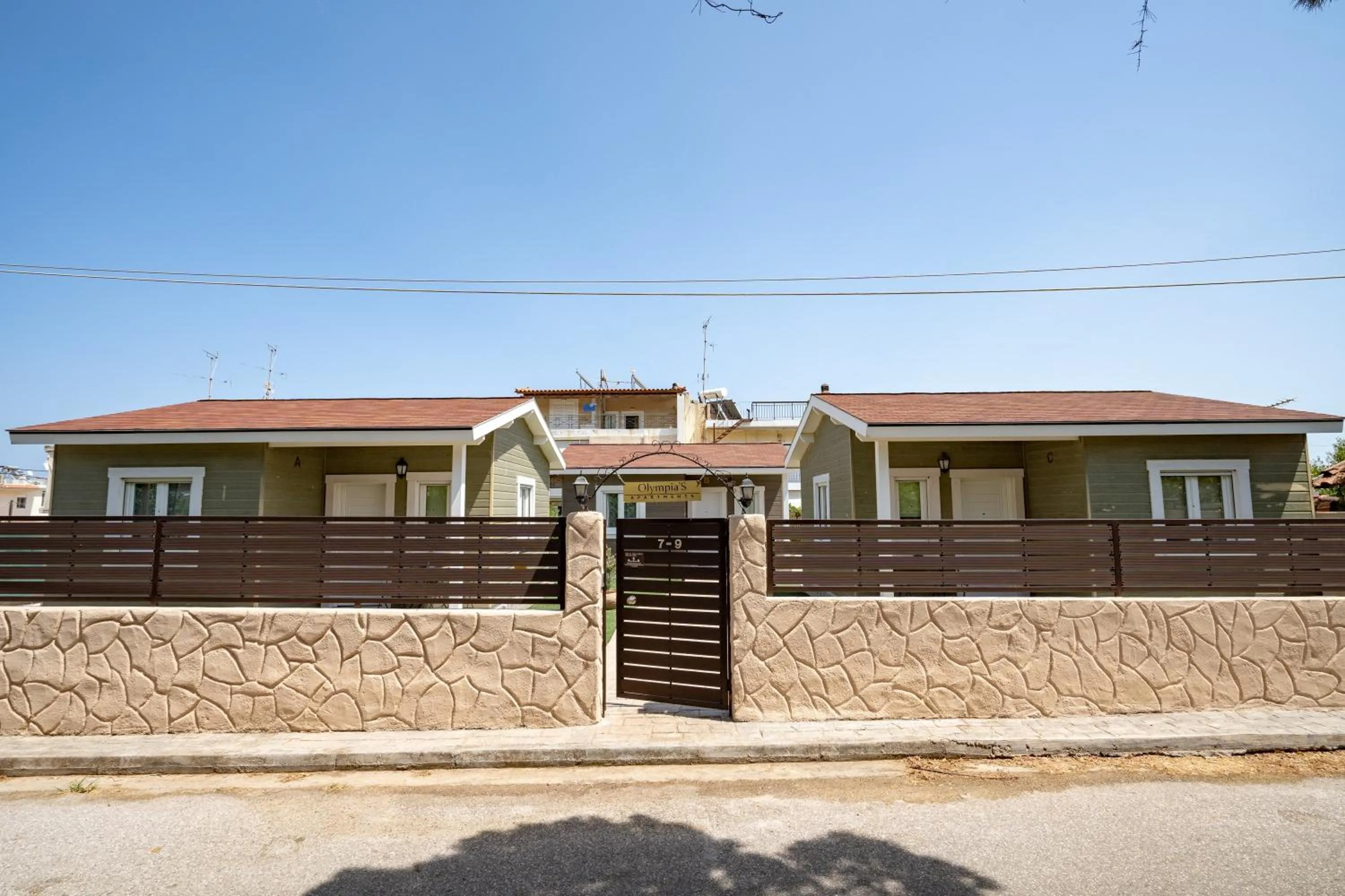 Property building in Olympia's Apartments by Traser