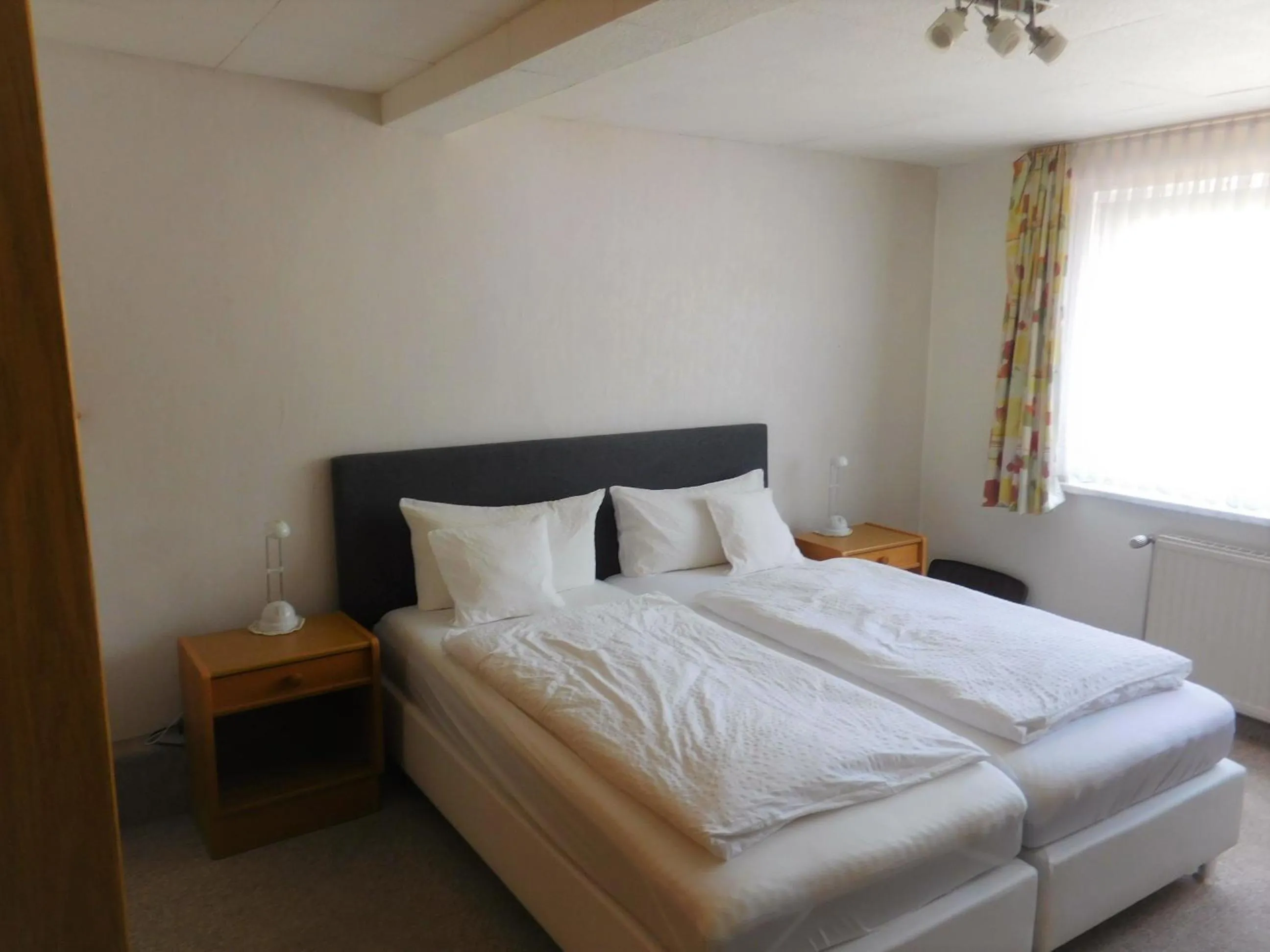 Photo of the whole room, Bed in Hotel Pension am Kurmittelhaus