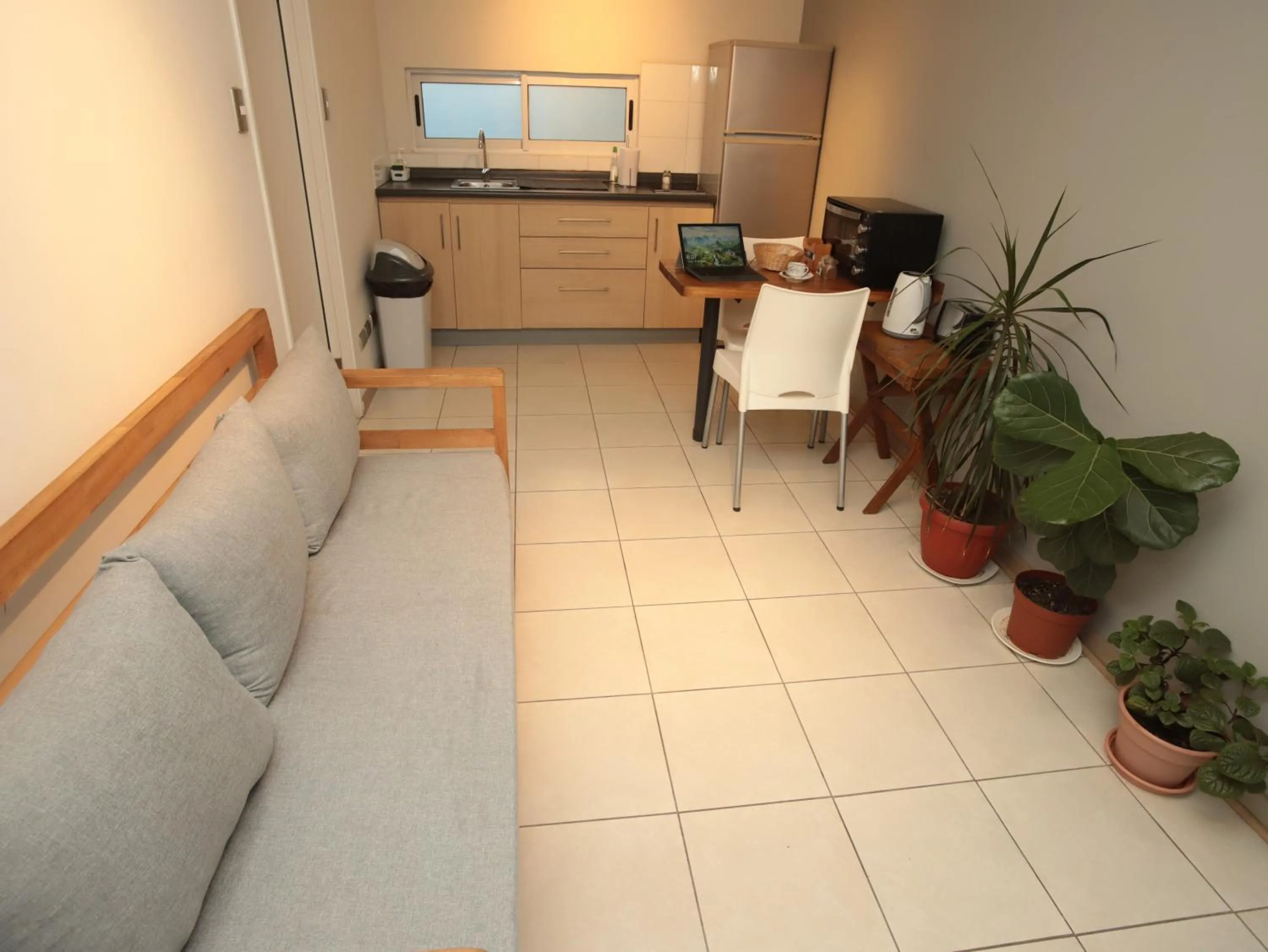 Kitchen or kitchenette in De Triana Hotel