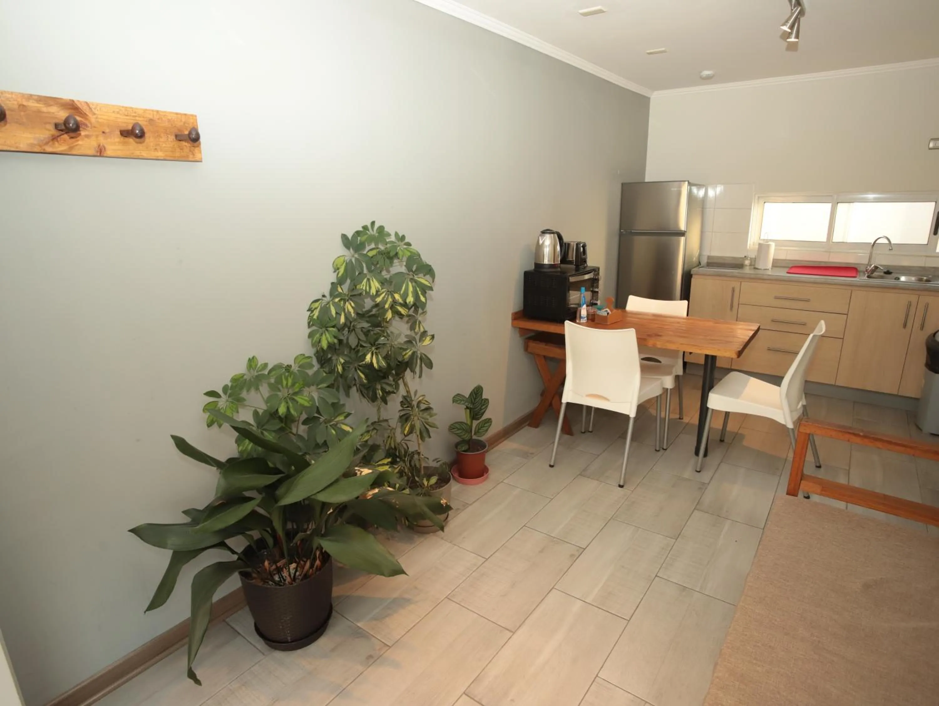 Kitchen or kitchenette in De Triana Hotel