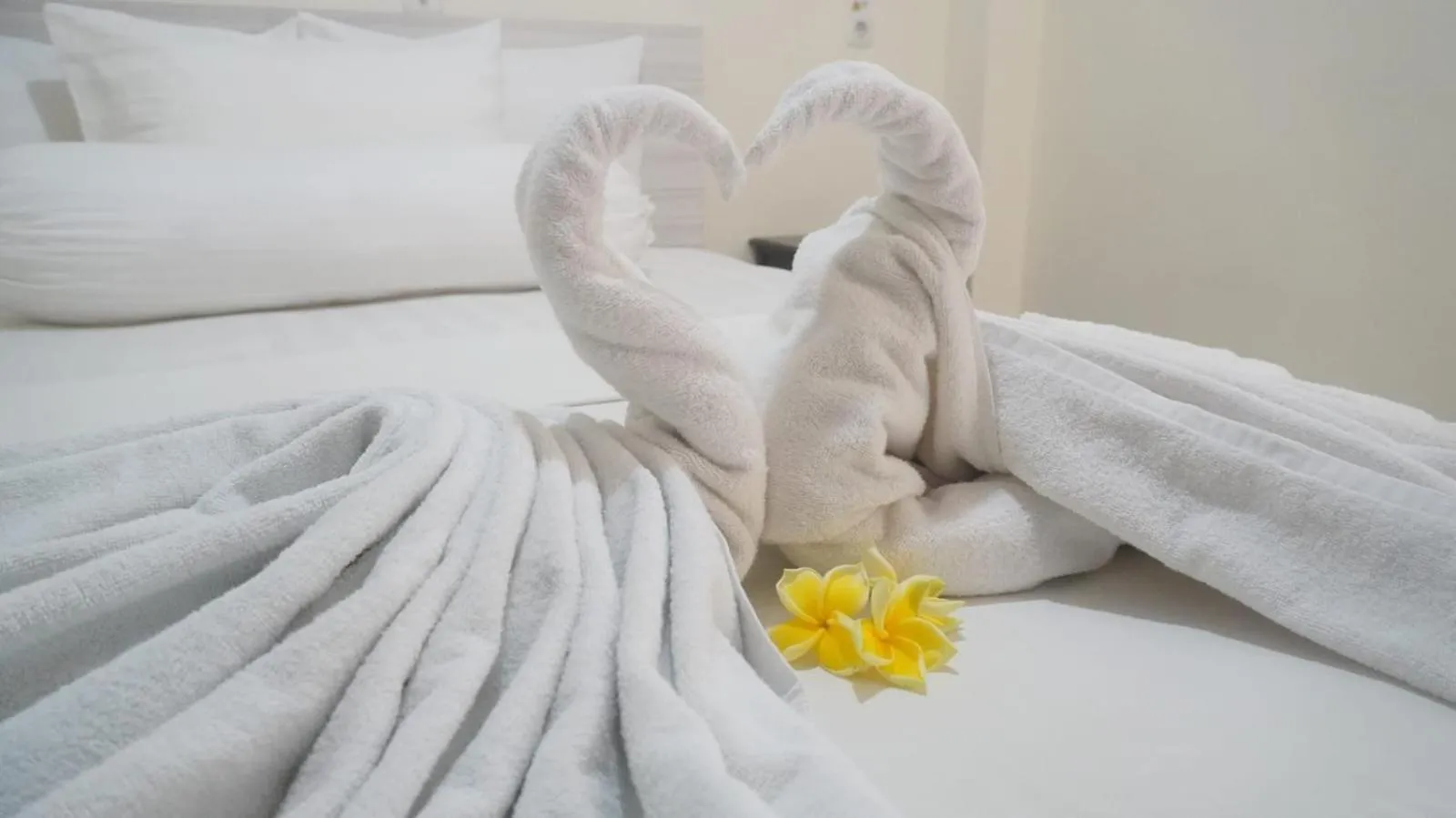 Bed in GRANADA INN PALU