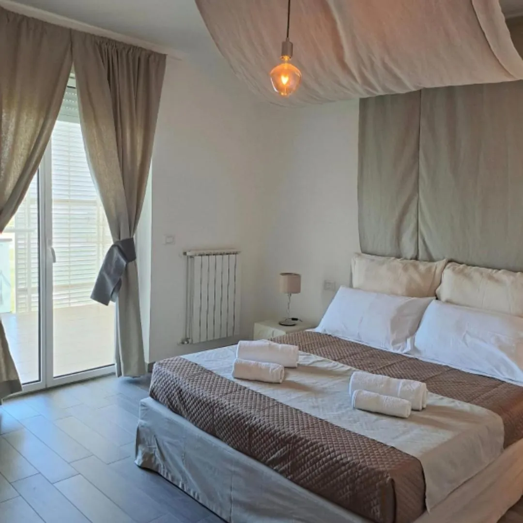 Bed in AIRPORT BARi DELUXE