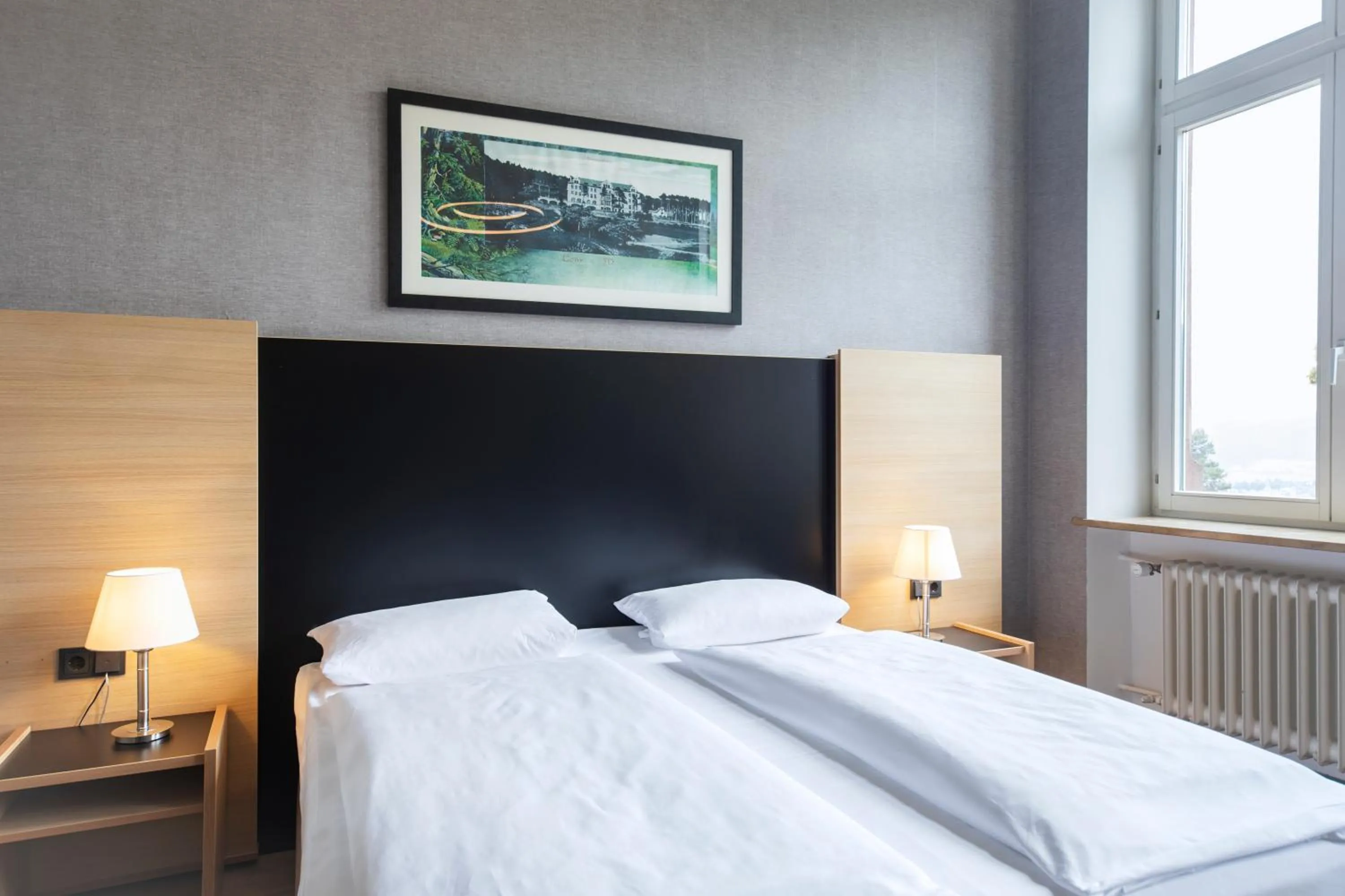 Photo of the whole room, Bed in Michel Hotel Franziskushöhe Lohr am Main