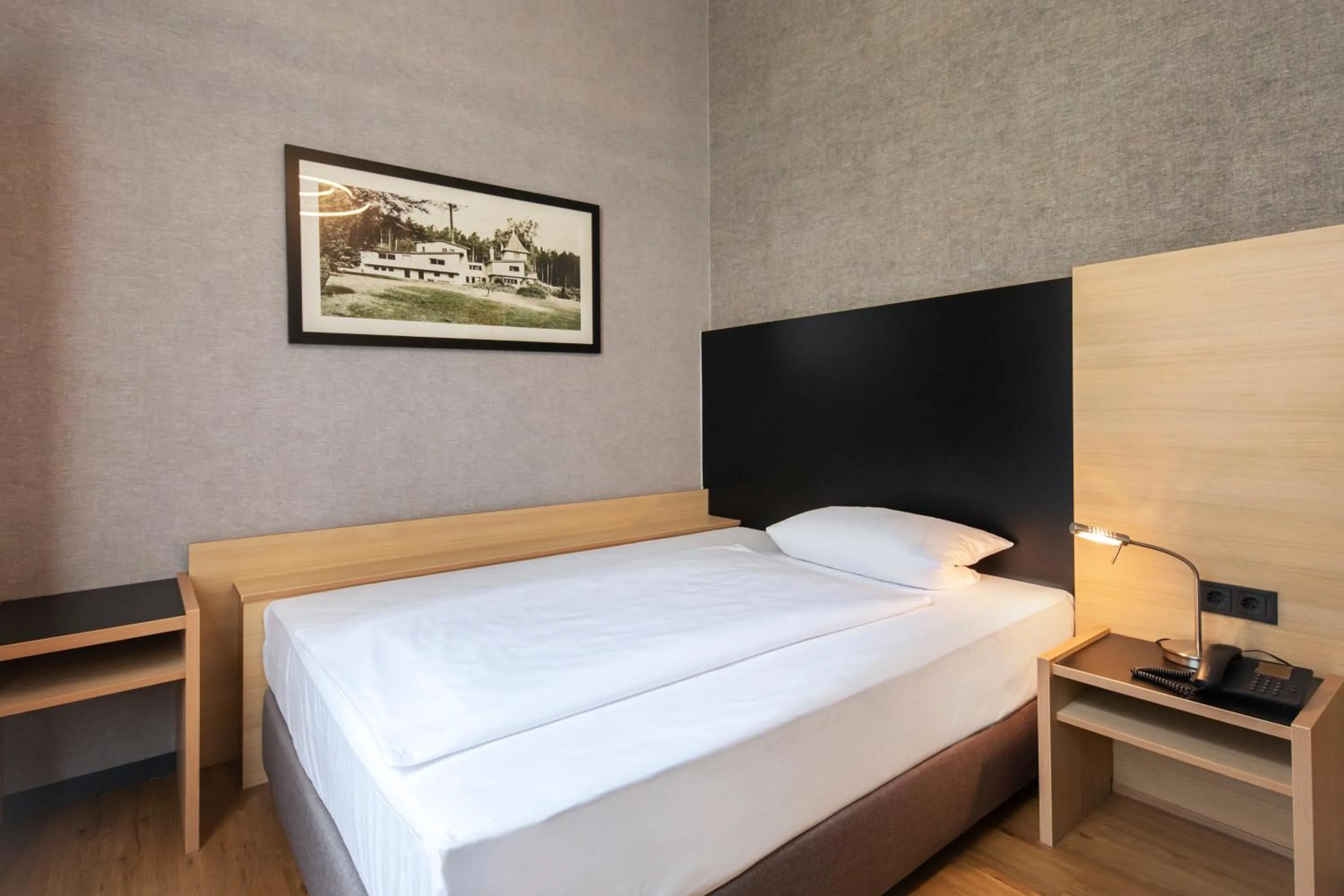 Photo of the whole room, Bed in Michel Hotel Franziskushöhe Lohr am Main