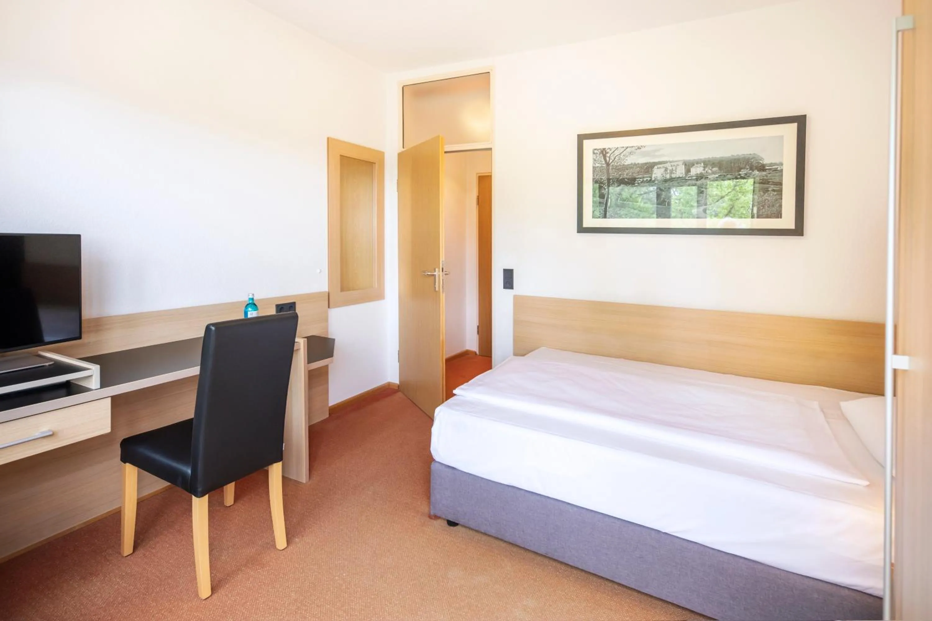 Photo of the whole room, Bed in Michel Hotel Franziskushöhe Lohr am Main