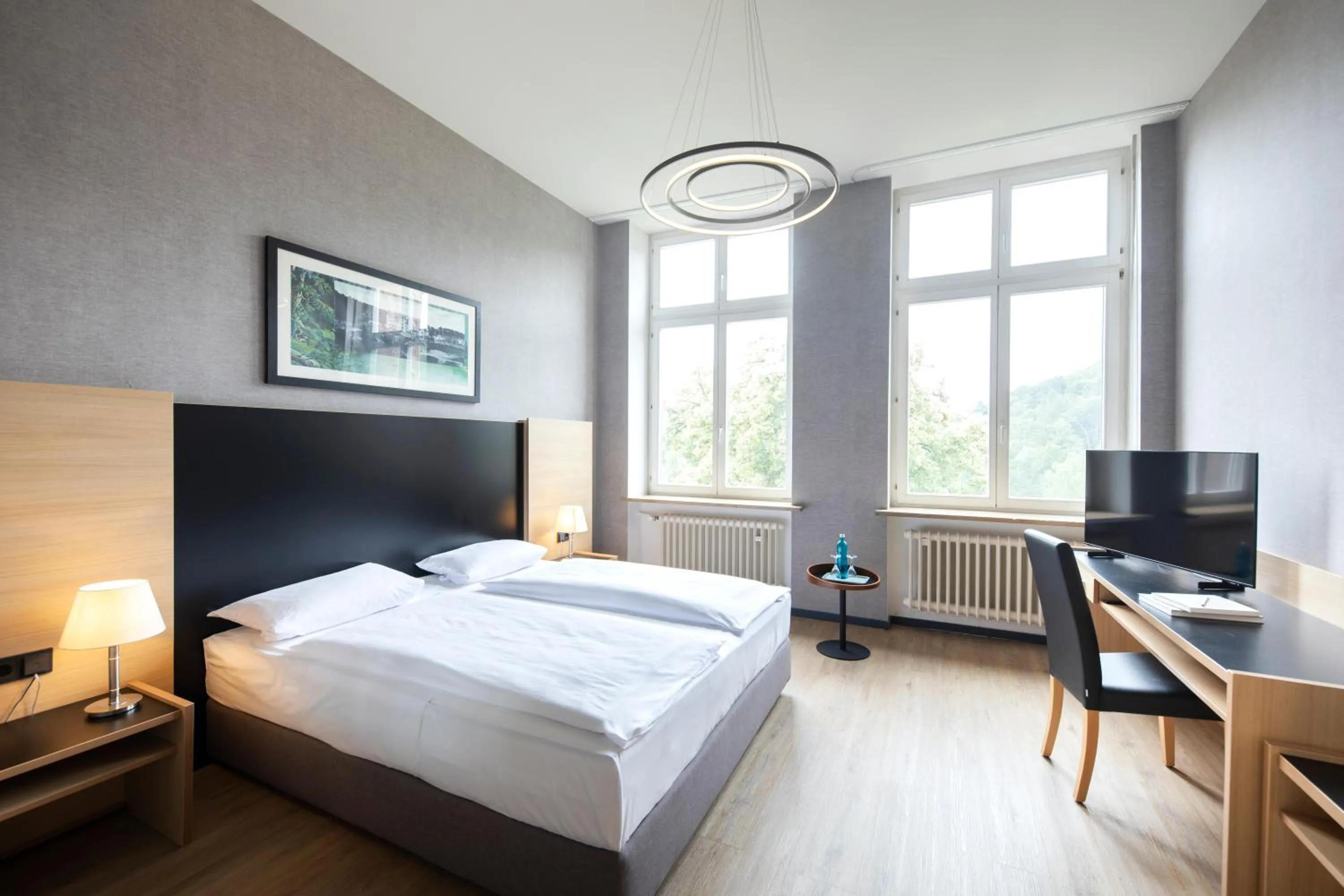 Photo of the whole room, Bed in Michel Hotel Franziskushöhe Lohr am Main