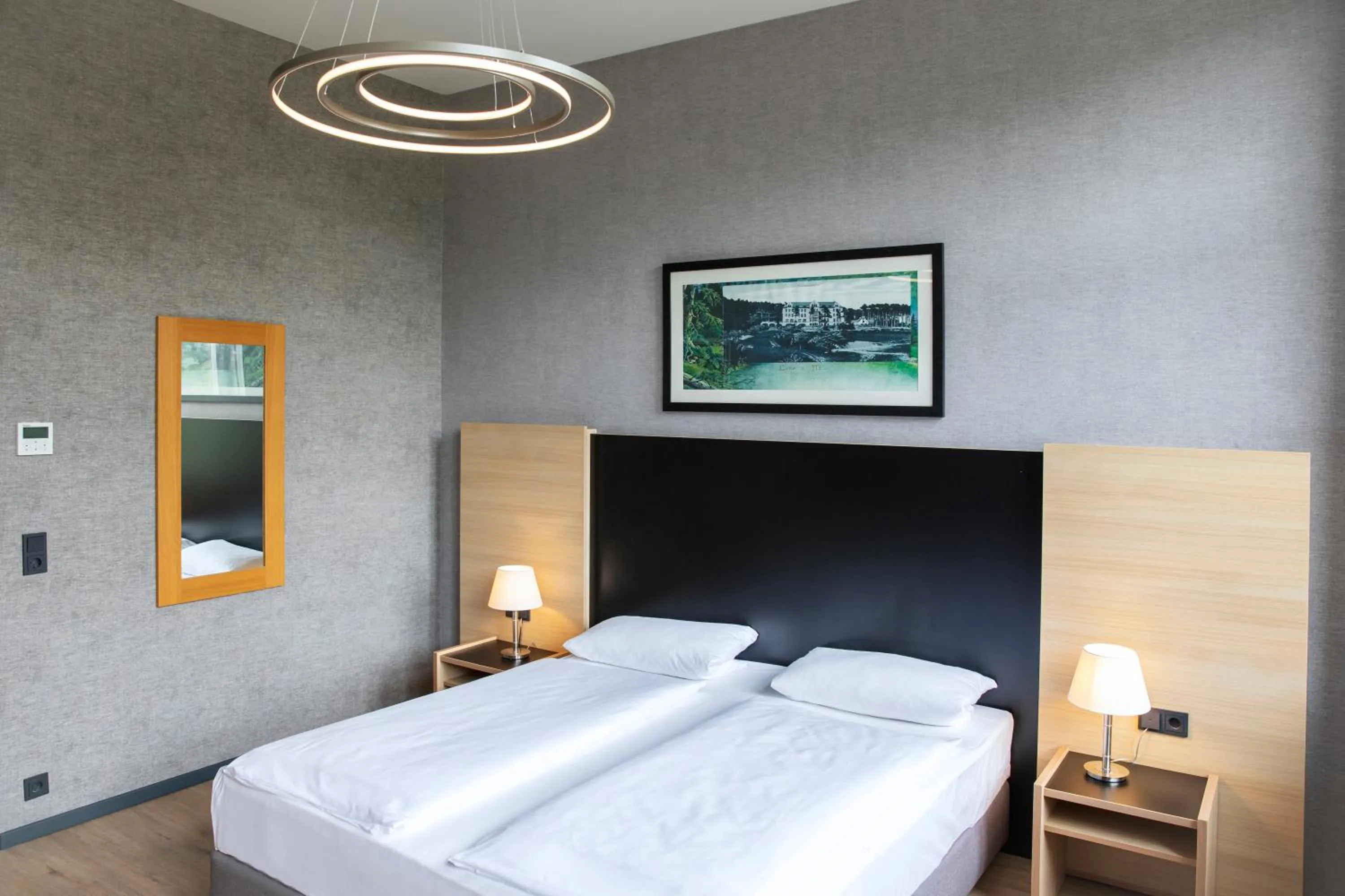 Photo of the whole room, Bed in Michel Hotel Franziskushöhe Lohr am Main