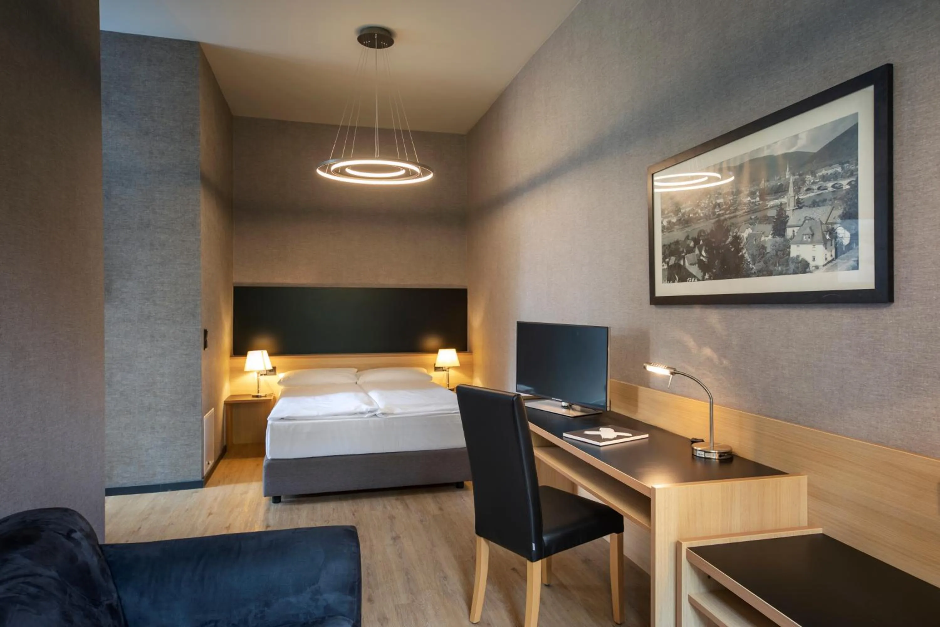 Photo of the whole room, Bed in Michel Hotel Franziskushöhe Lohr am Main