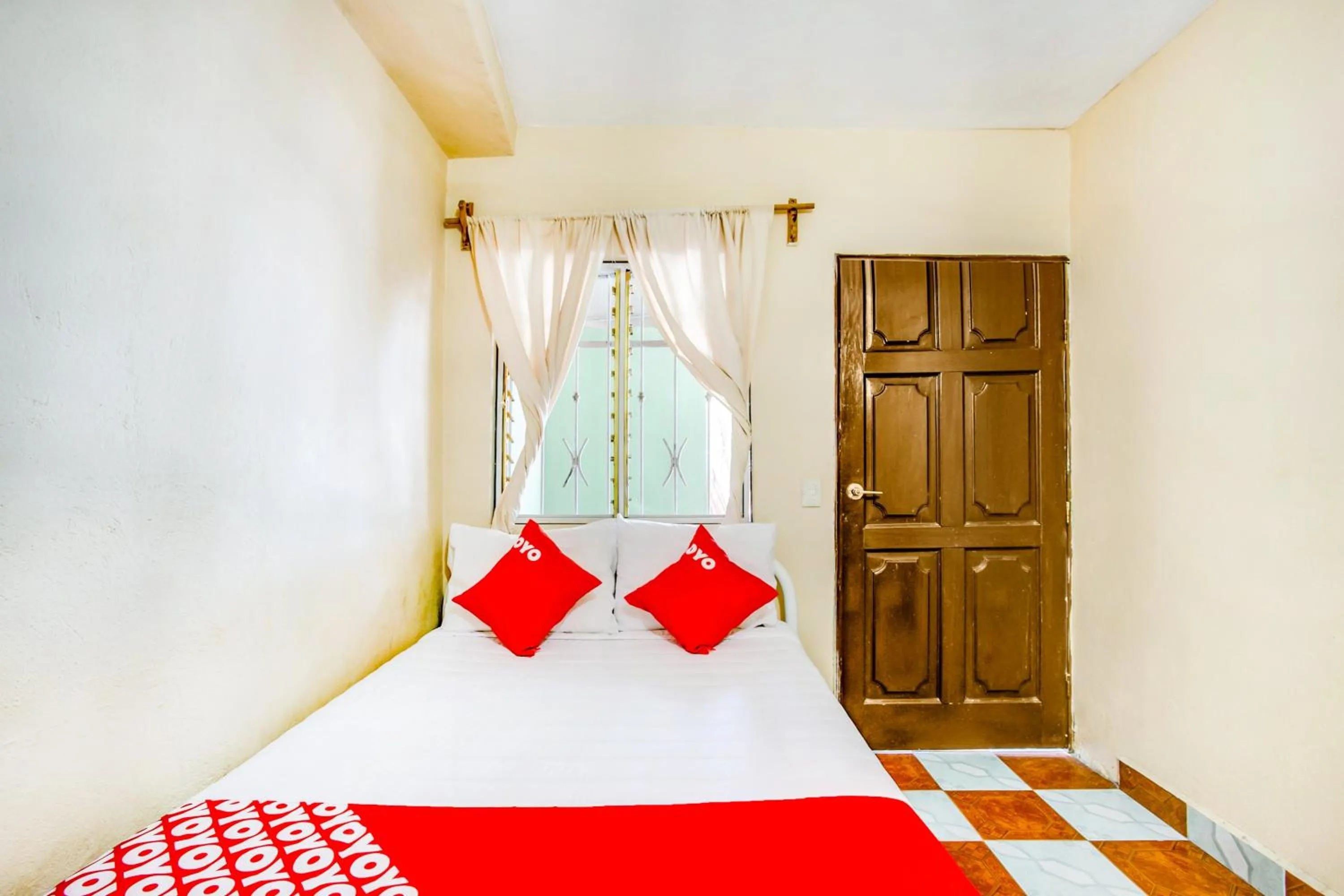 Bedroom, Bed in OYO Hotel Margarita