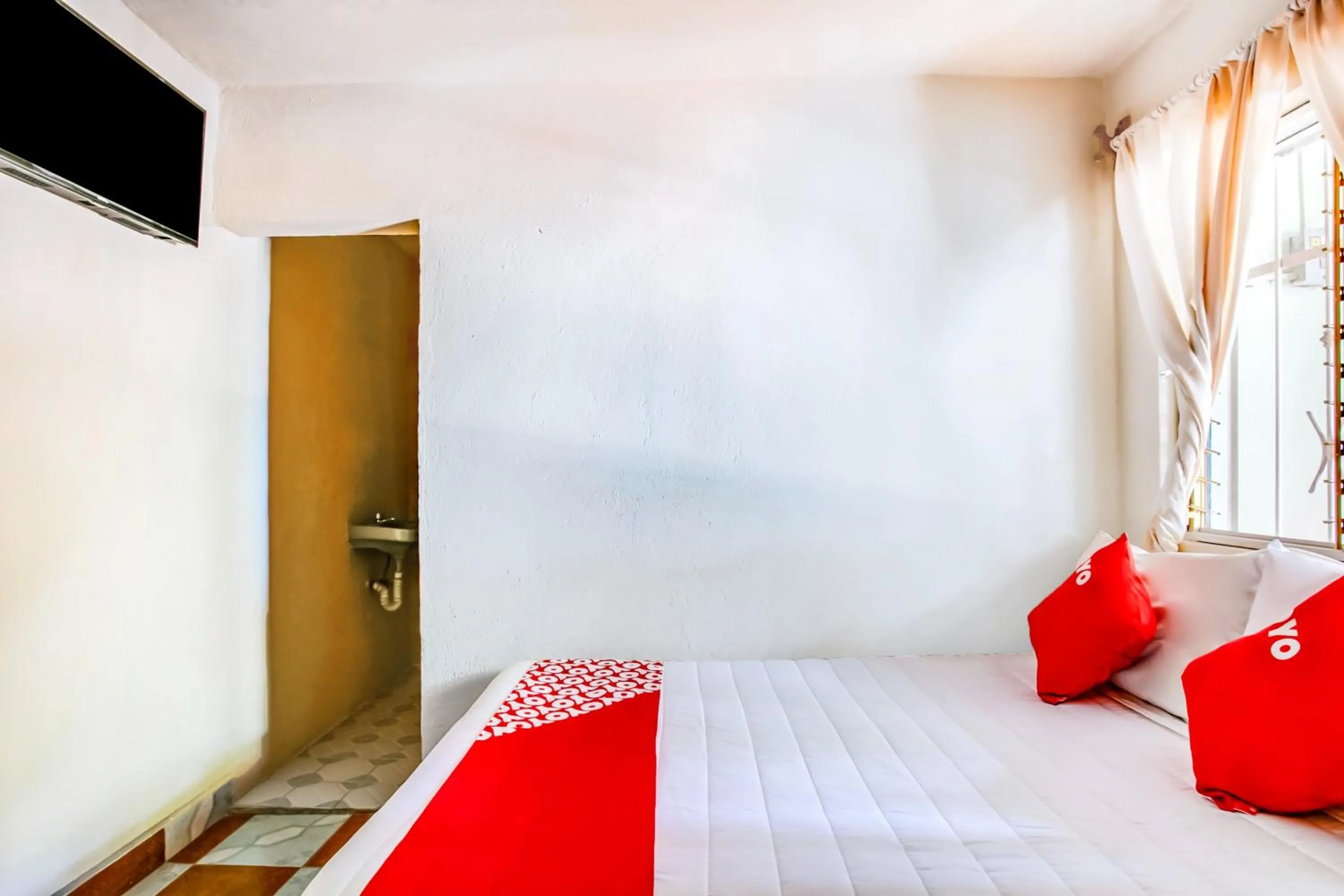 Bedroom, Bed in OYO Hotel Margarita