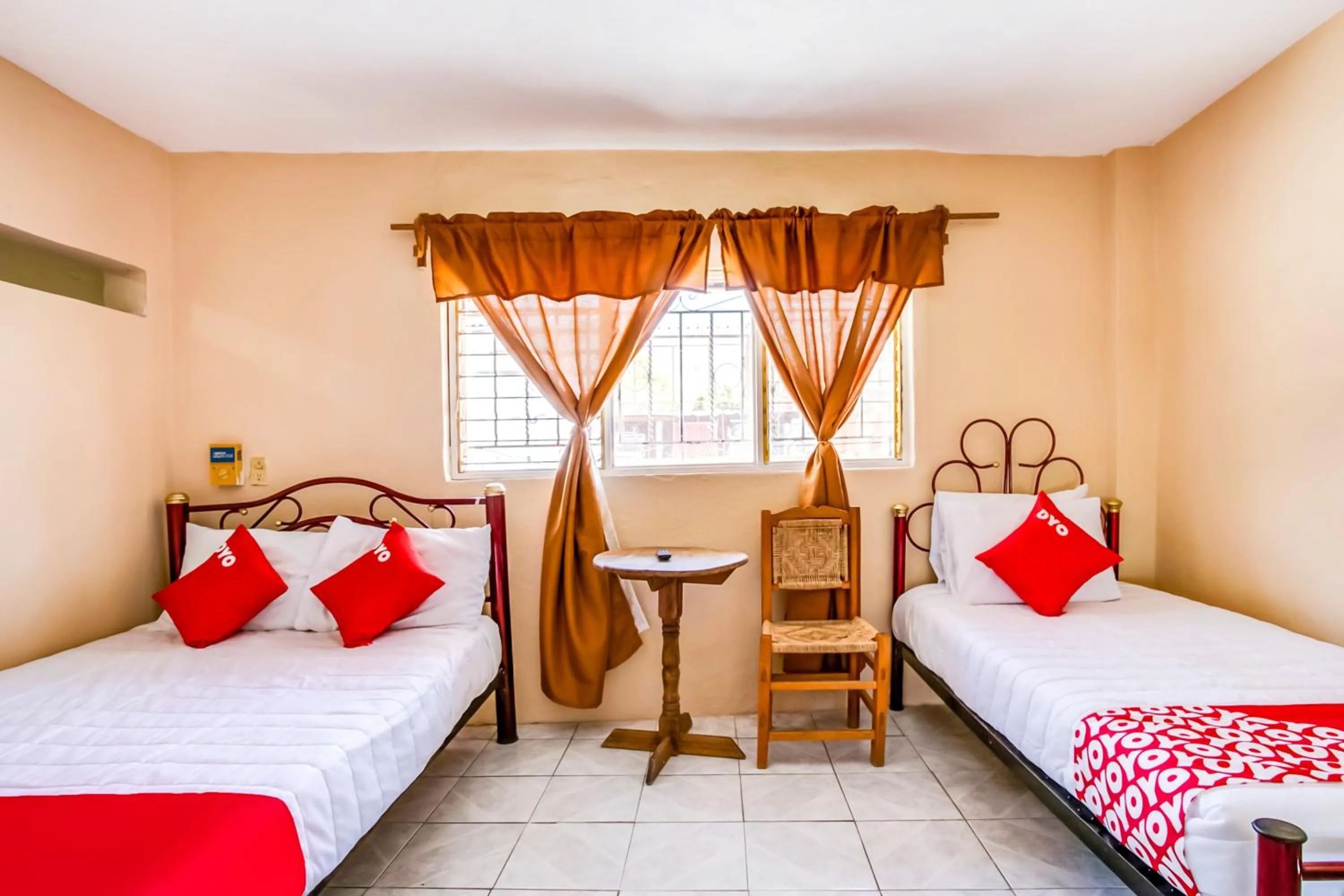 Bedroom, Bed in OYO Hotel Margarita