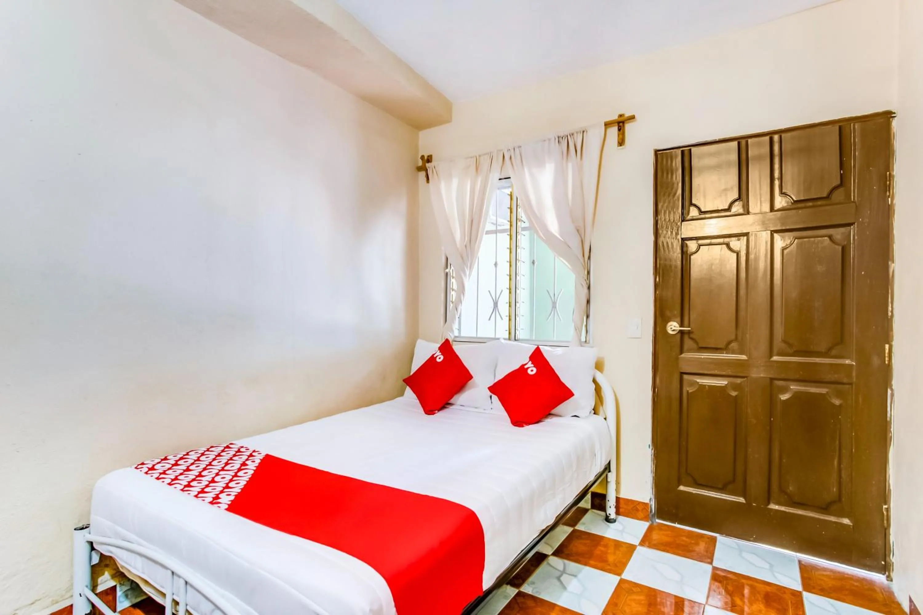 Bedroom, Bed in OYO Hotel Margarita