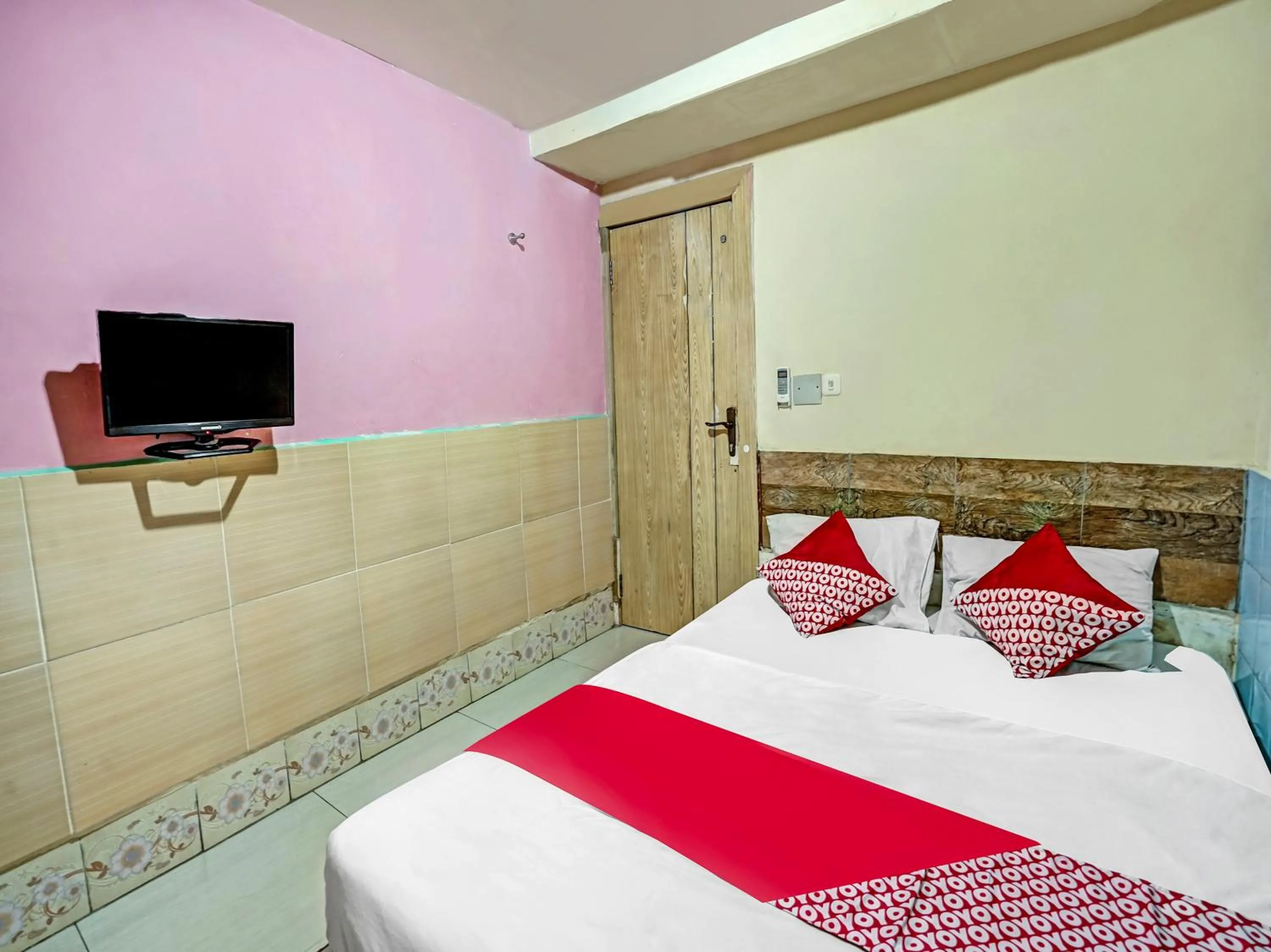 Bedroom in OYO 90158 Hotel Lendosis Perintis Kemerdekaan