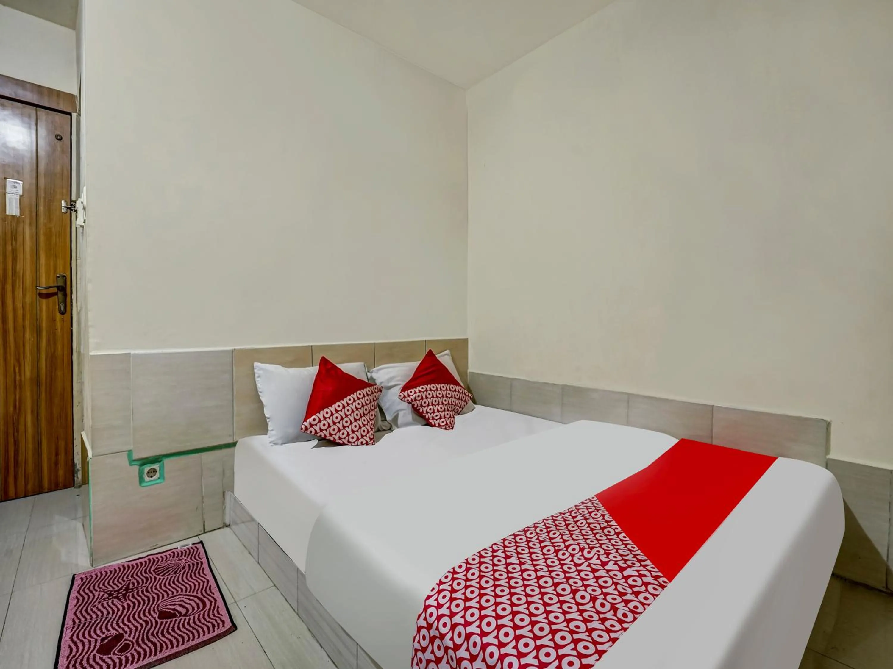 Bedroom in OYO 90158 Hotel Lendosis Perintis Kemerdekaan