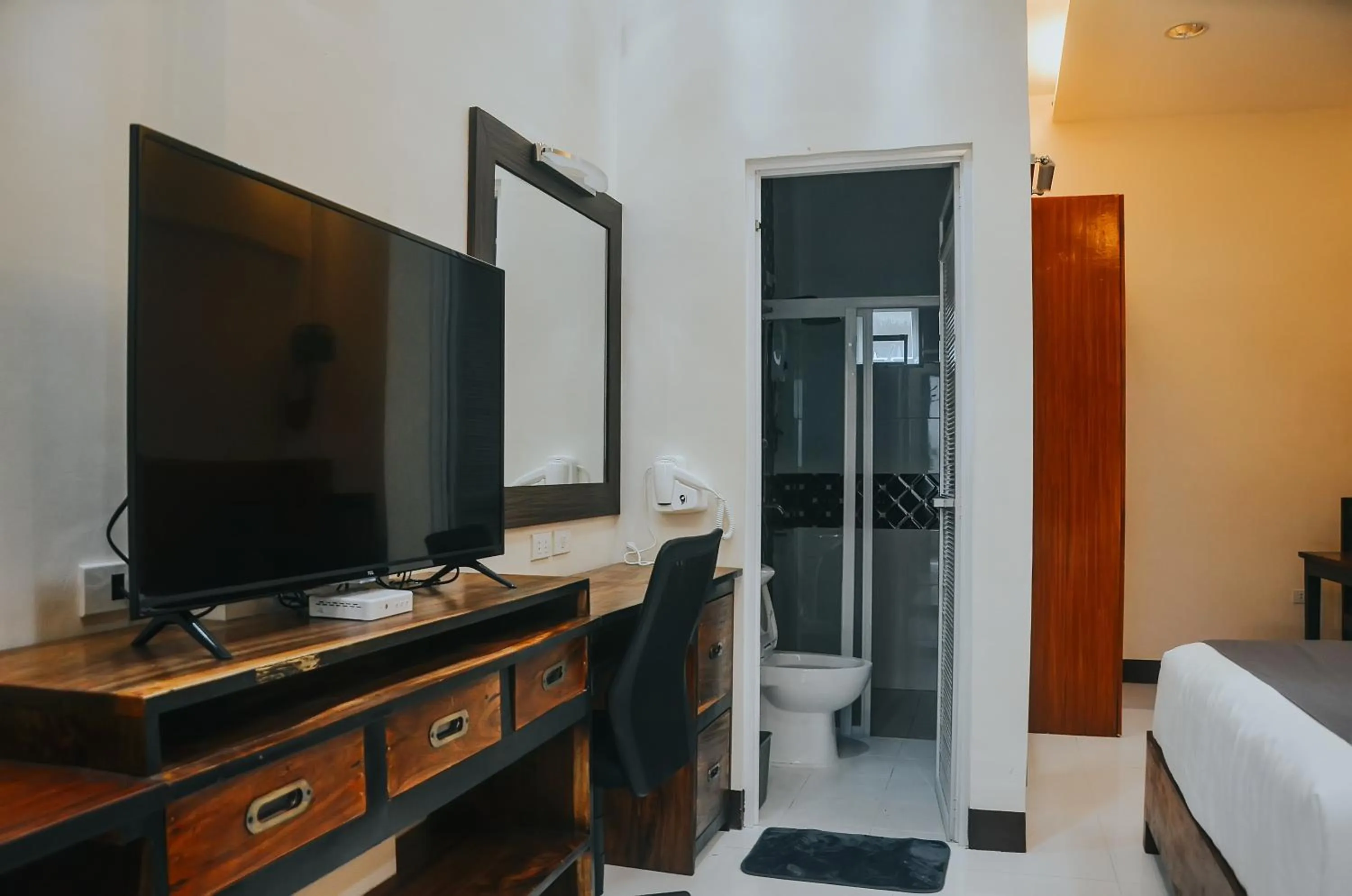 Shower, Bed in Villa MJ Maristela Beach Resort