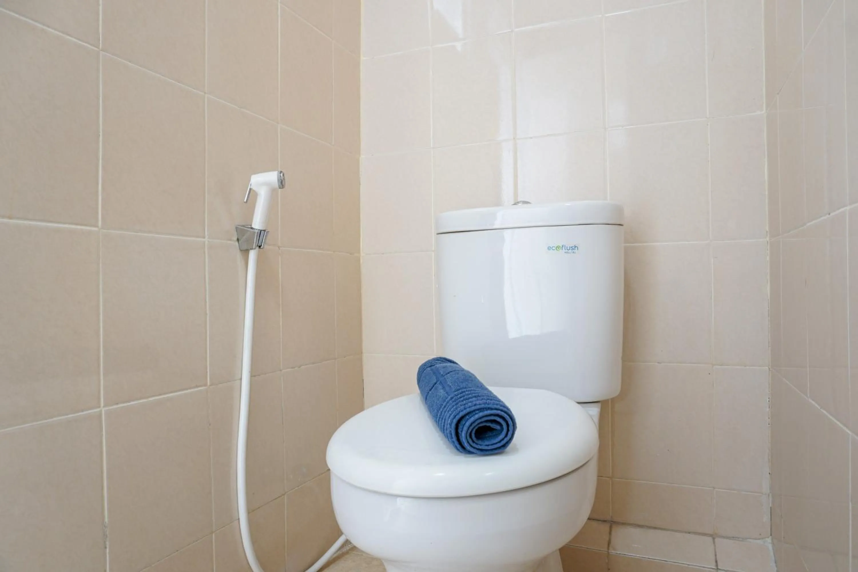 Bathroom in Comfortable 3BR Apartment at Green Palm Residences By Travelio