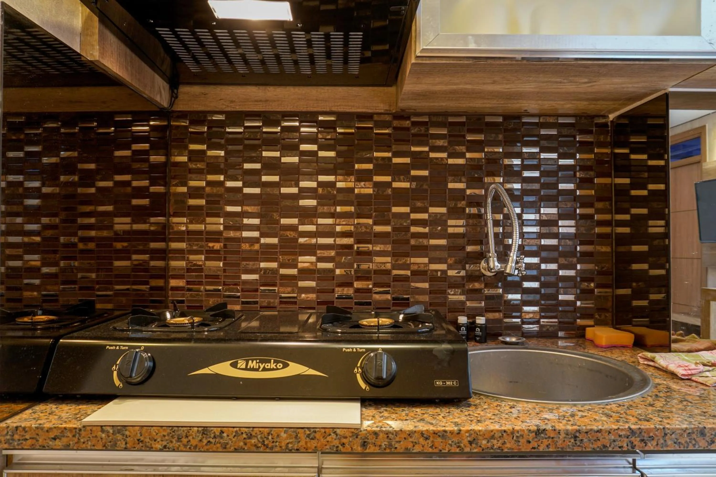 Comfortable 3BR Apartment at Green Palm Residences By Travelio