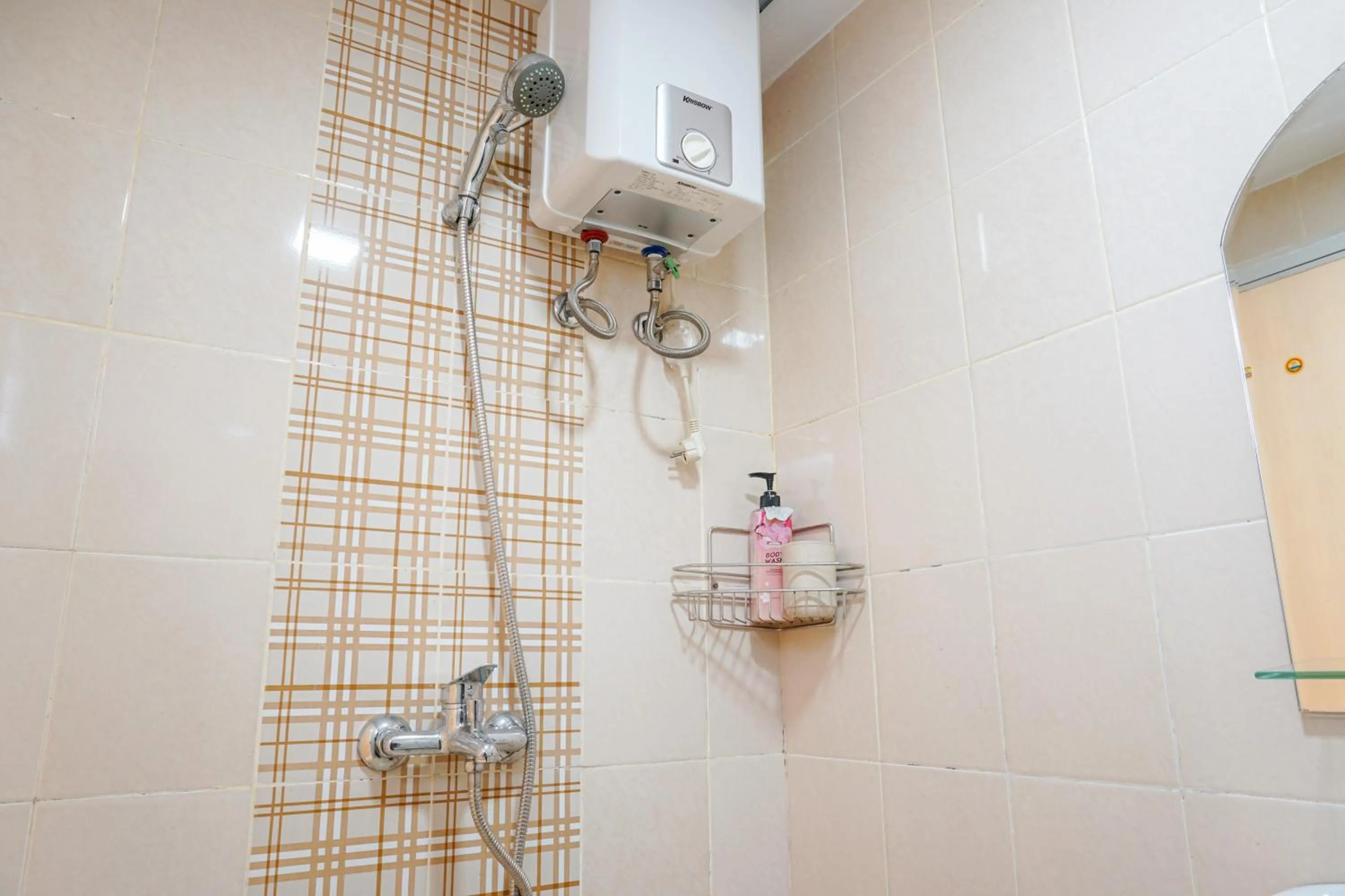 Comfortable 3BR Apartment at Green Palm Residences By Travelio