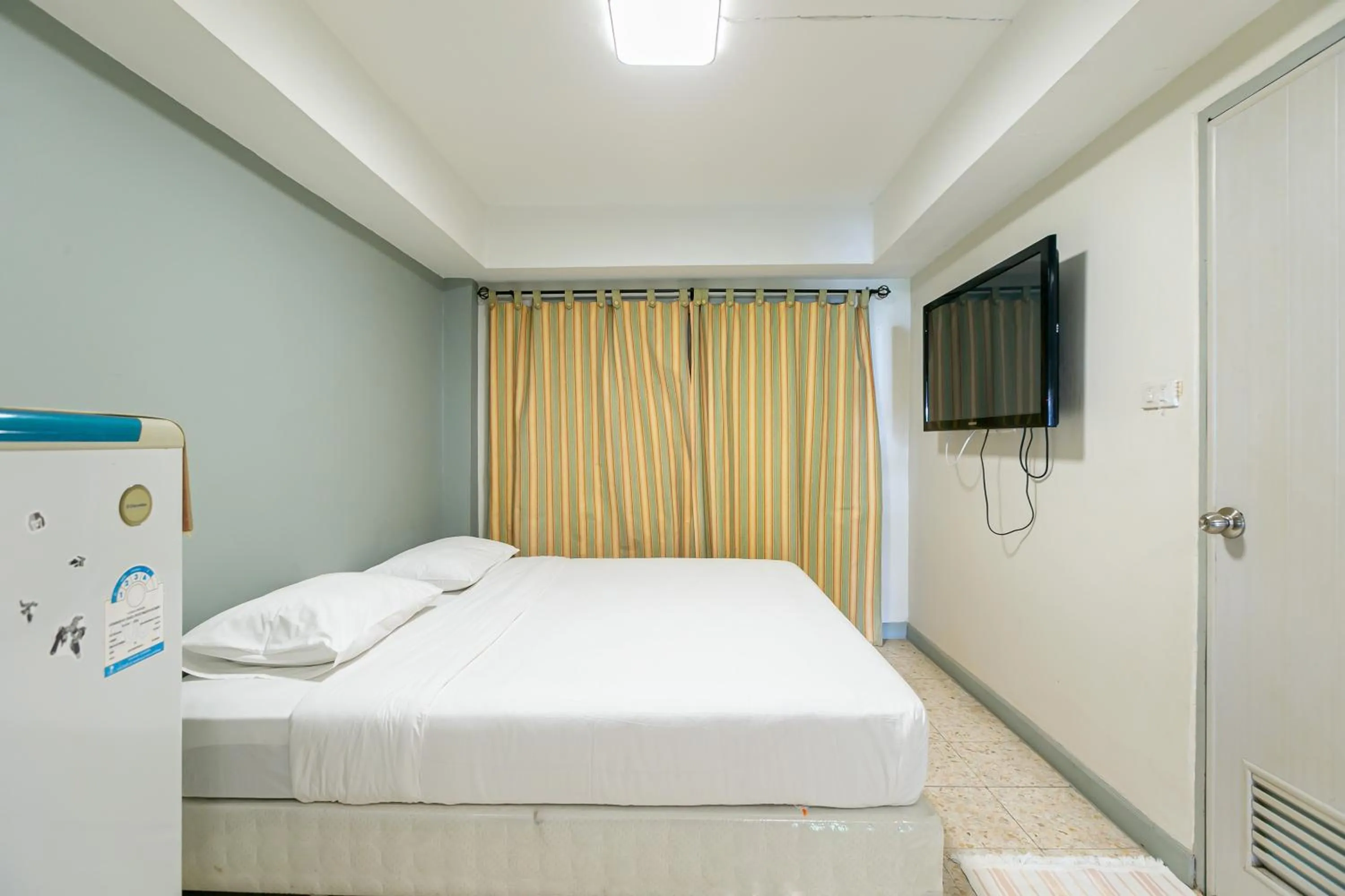 Bed in Wong Amat House