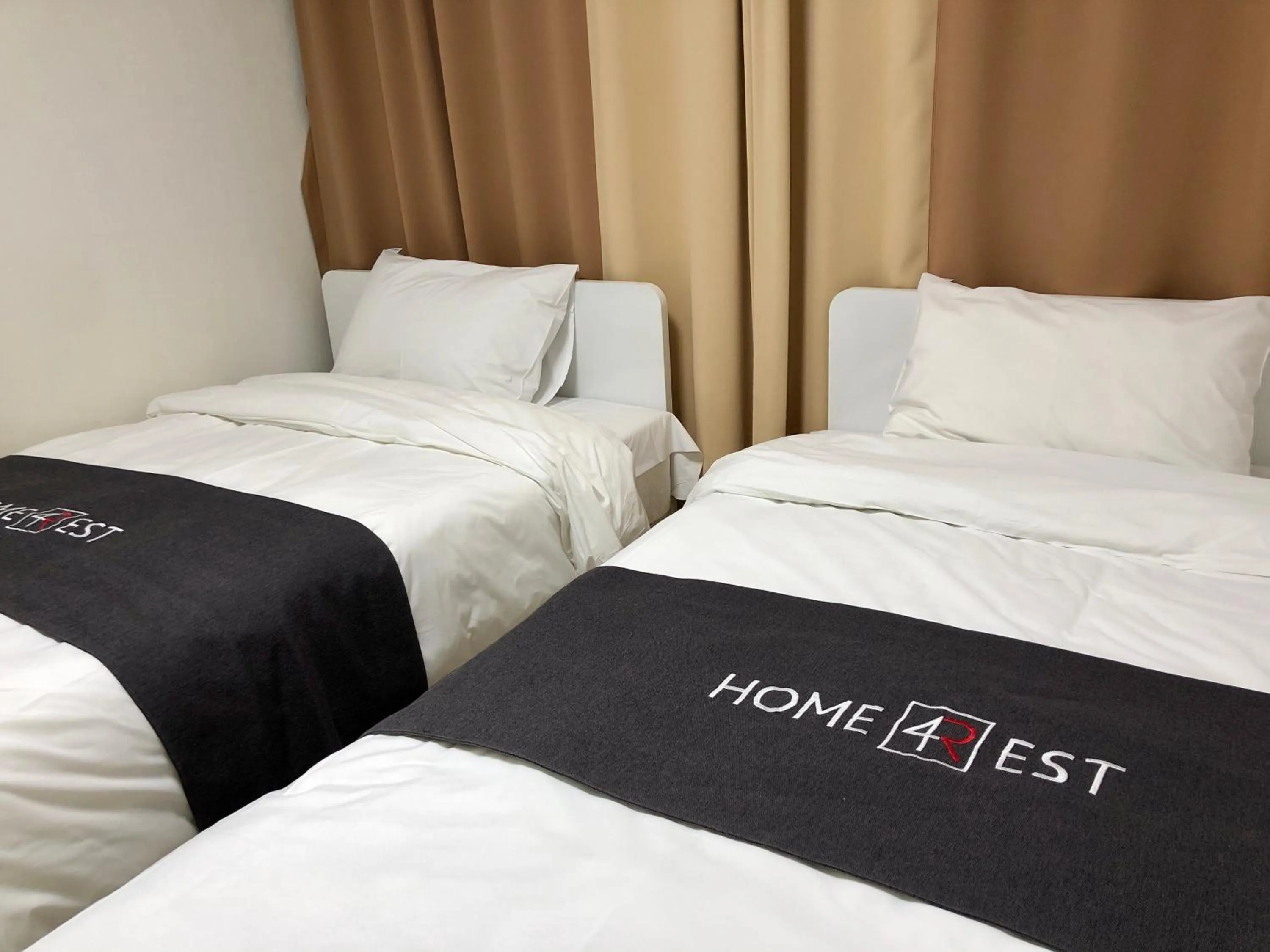 Bed in JS Residence Hotel Okpo