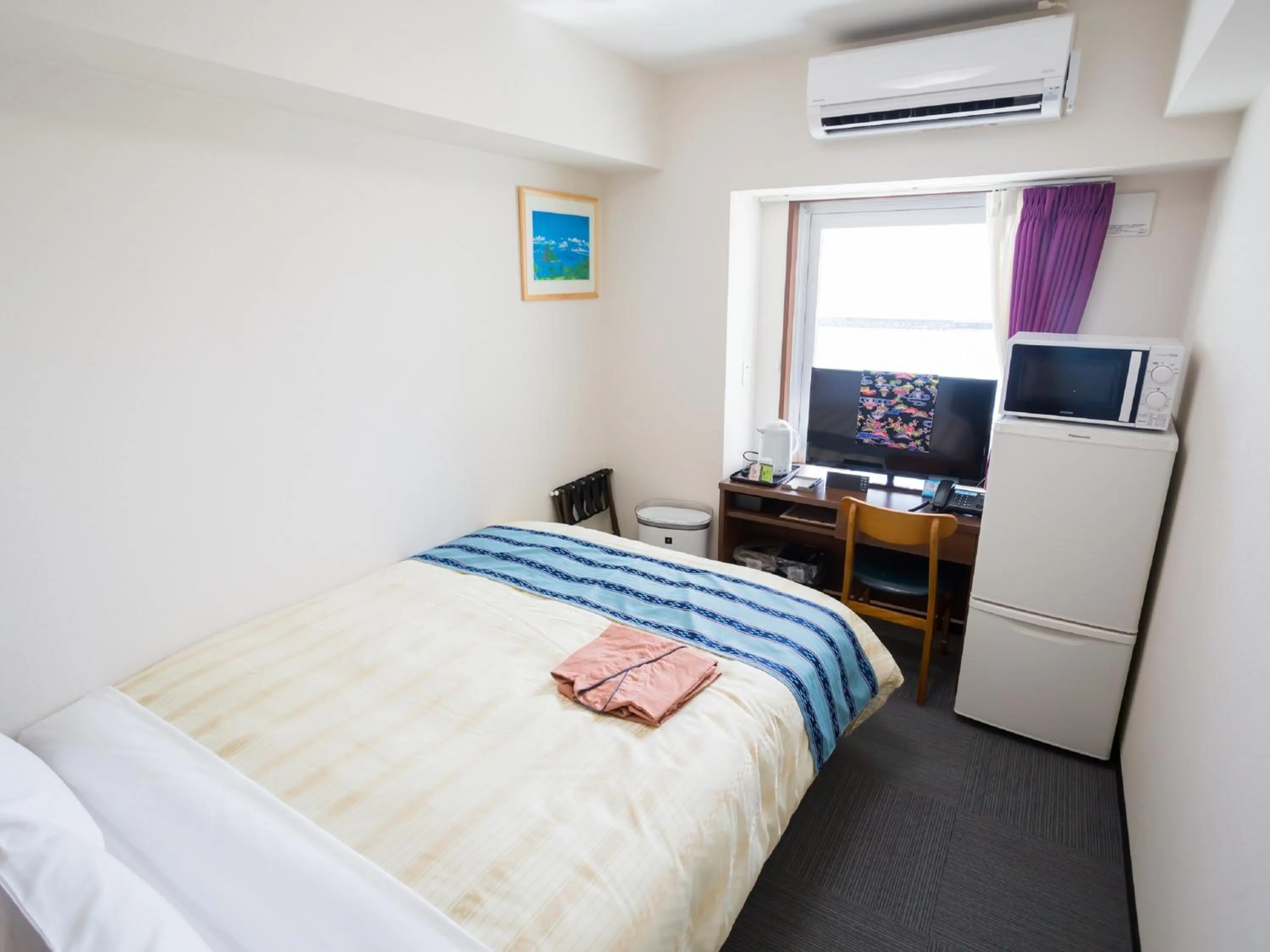 Photo of the whole room, Bed in Hotel Peace Island Nago