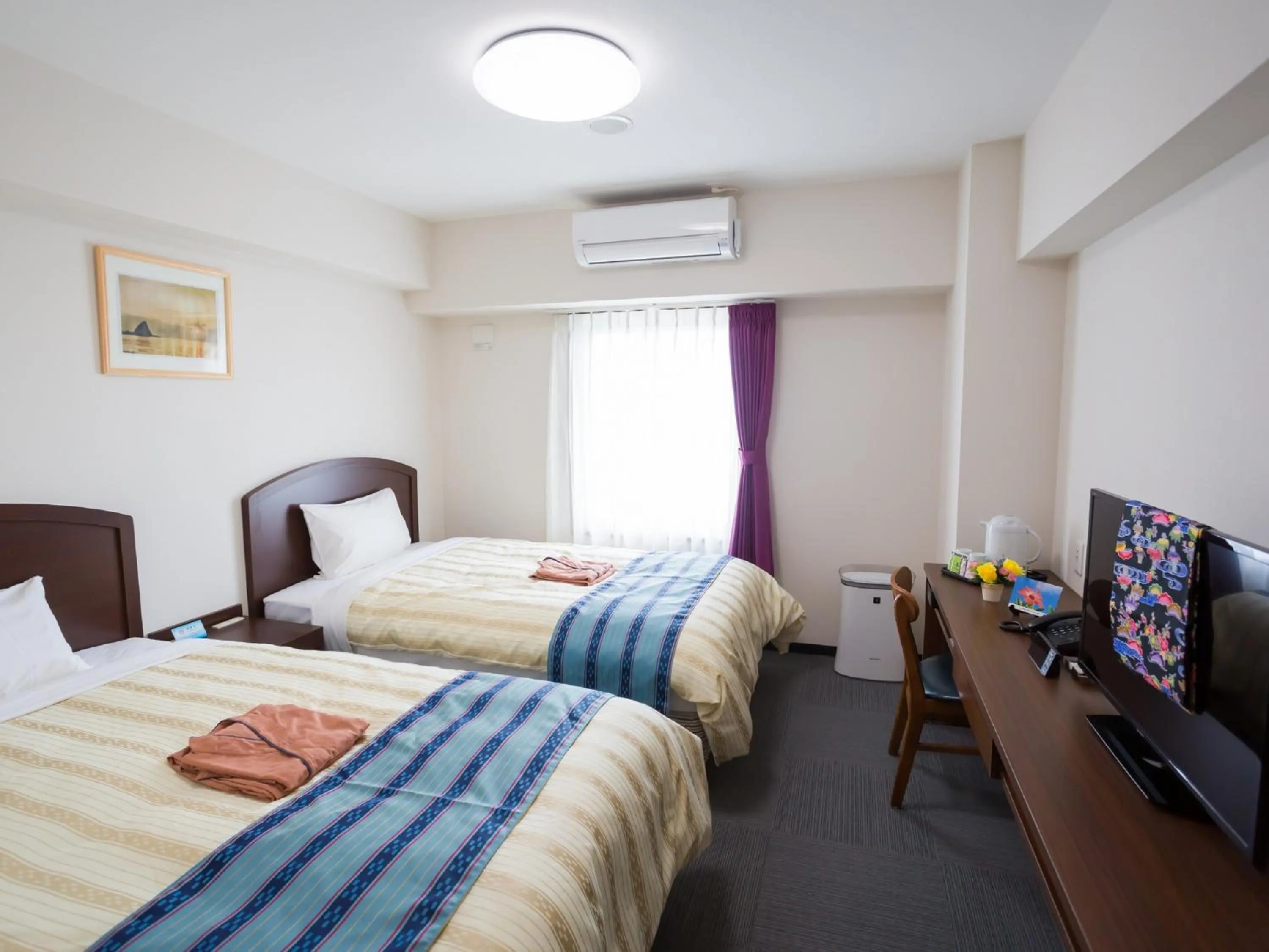 Photo of the whole room, Bed in Hotel Peace Island Nago