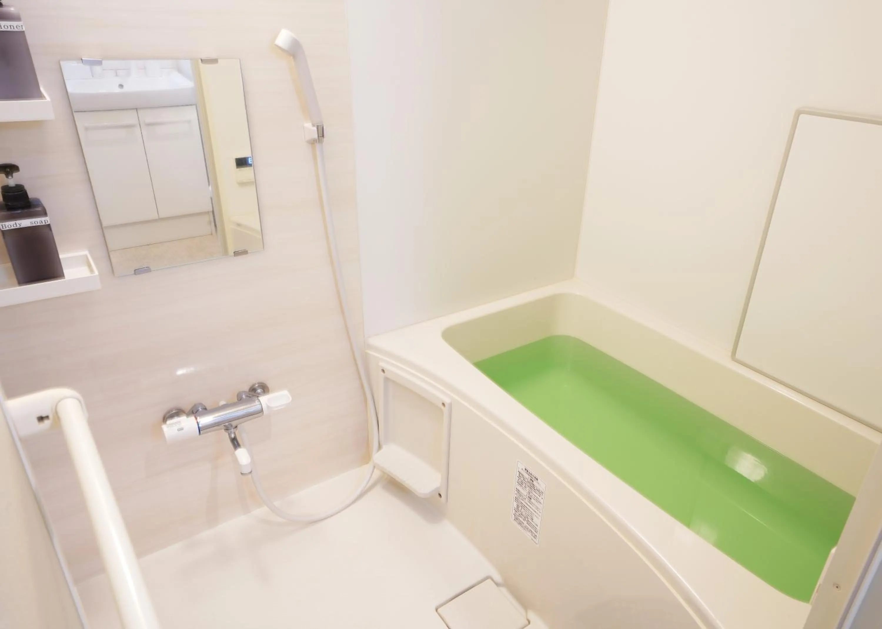 Bathroom in Laffitte Hirai Condominium Hotel